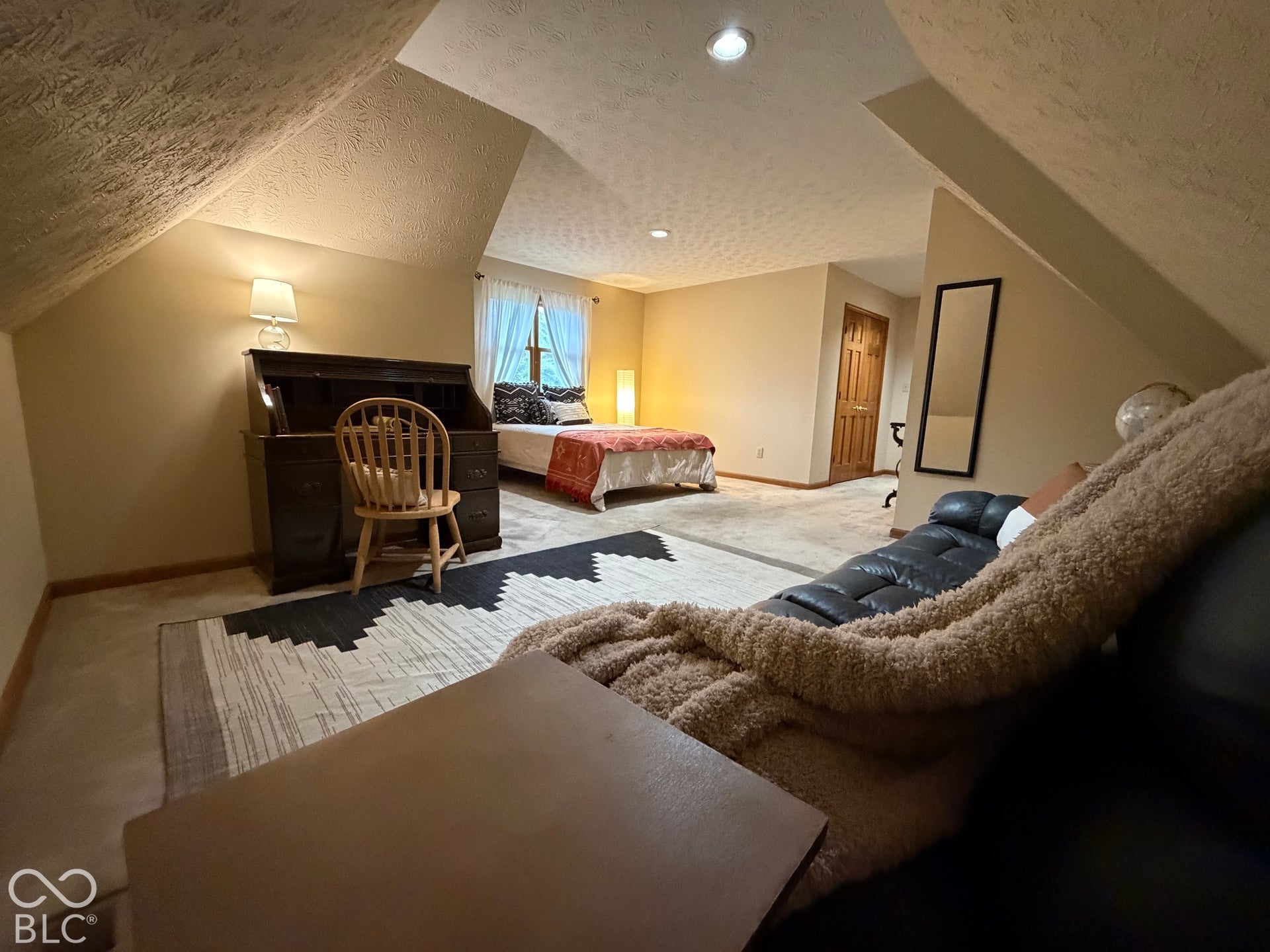So many options for enjoying this bedroom.