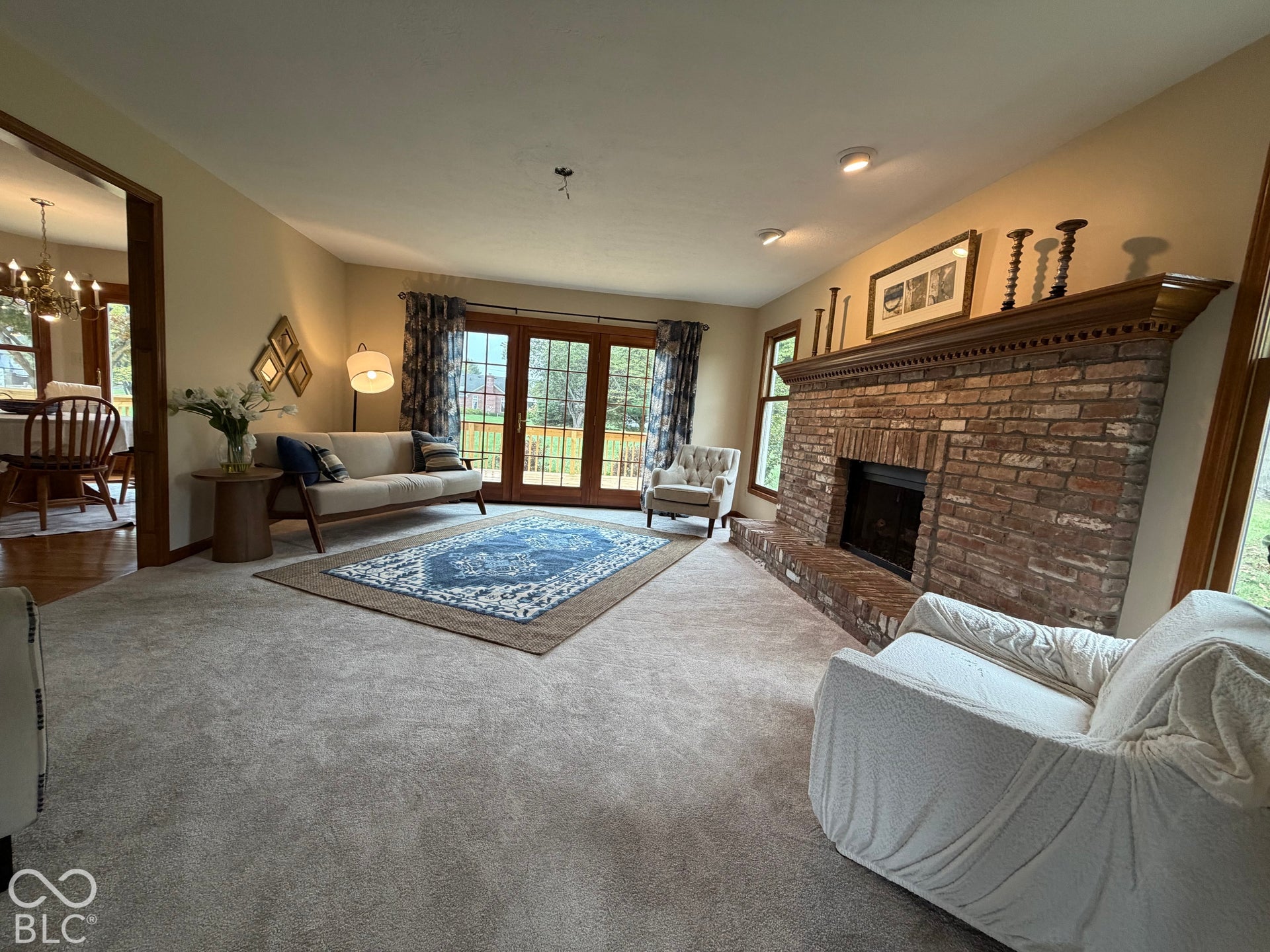 Spacious family room with abundance of ambient lighting (including a ceiling light coming soon), is the perfect place to watch the game, host book club, Mahjong, or just curl up with a good book or movie.