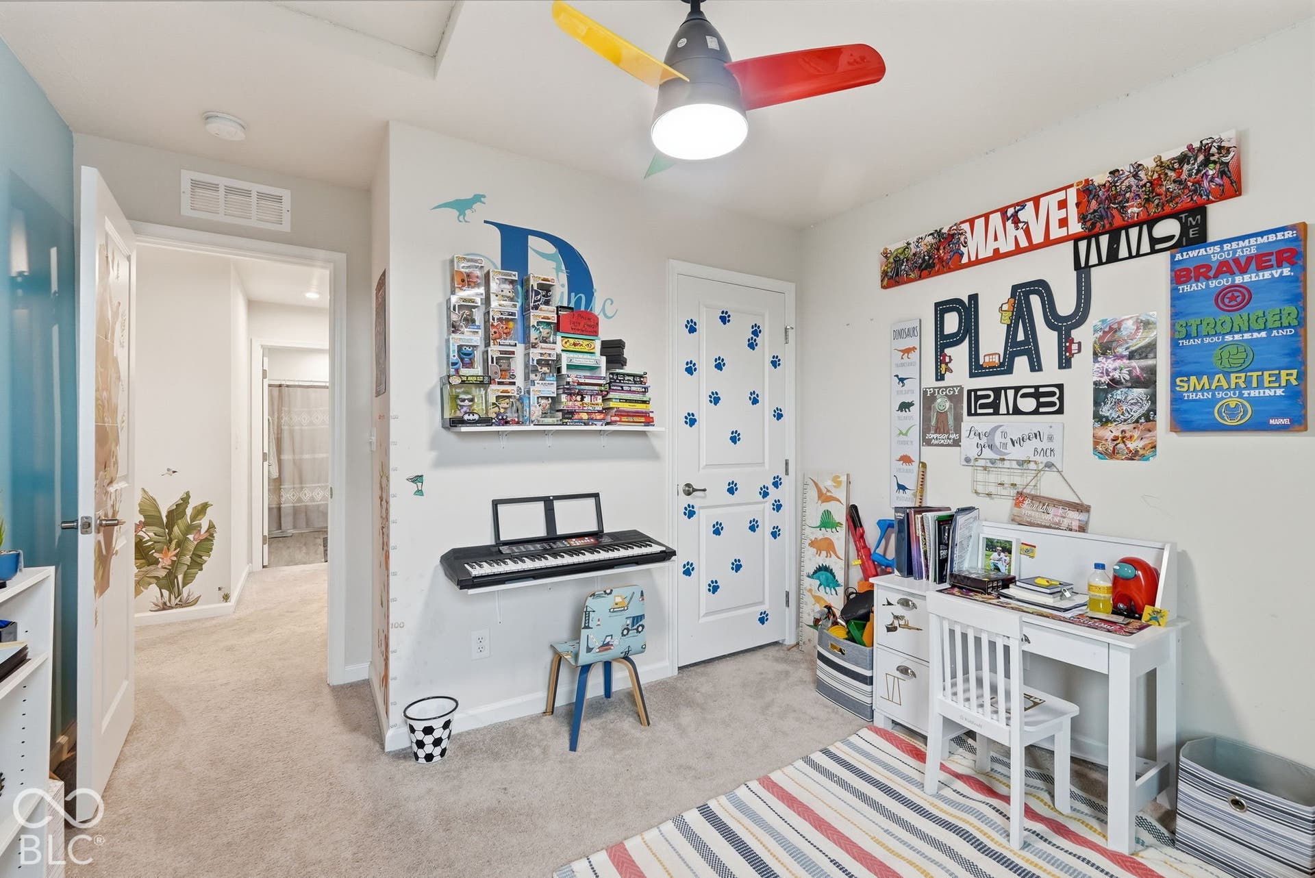 275 Bohicket Road, Whiteland, IN 46184 Bedroom featuring neutral carpeting, a multi-colored ceiling fan with an integrated light fixture, and a solid-core interior door