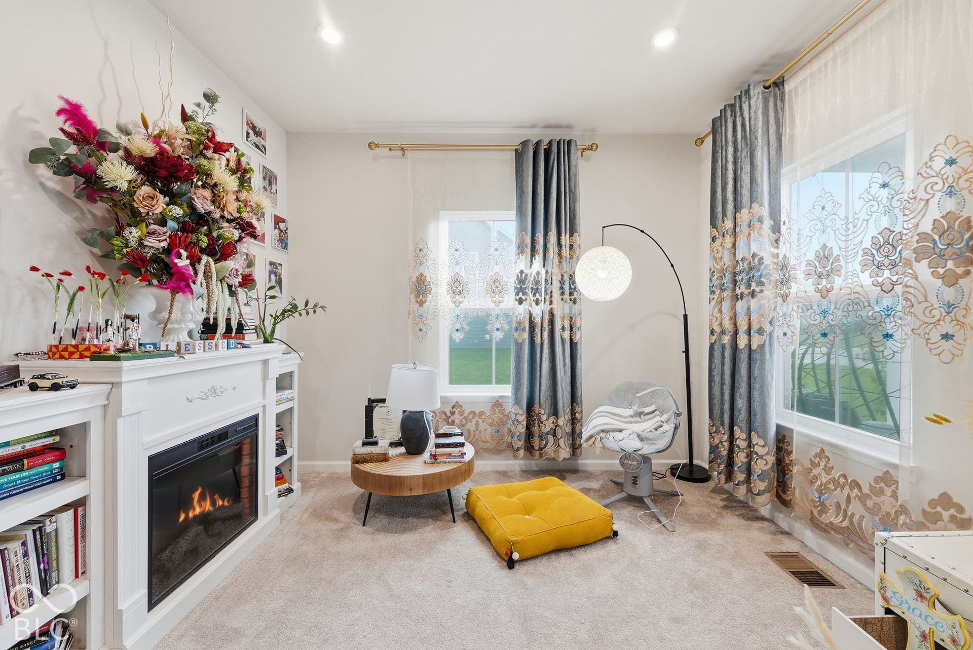 275 Bohicket Road, Whiteland, IN 46184 Built-in white fireplace mantel, integrated shelving units, recessed lighting, and dual windows