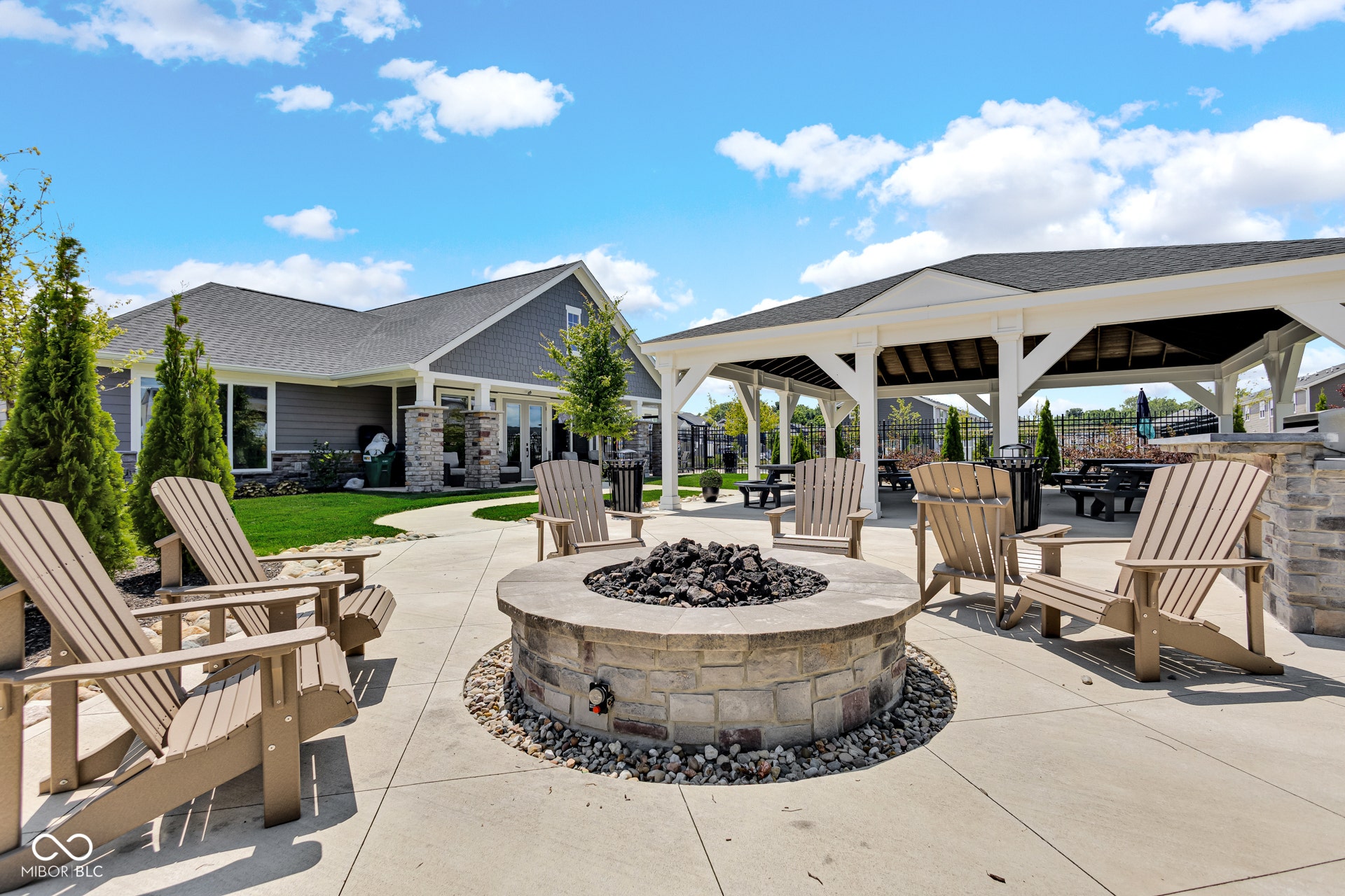 view of patio / terrace with an outdoor fire pit and a gazebo