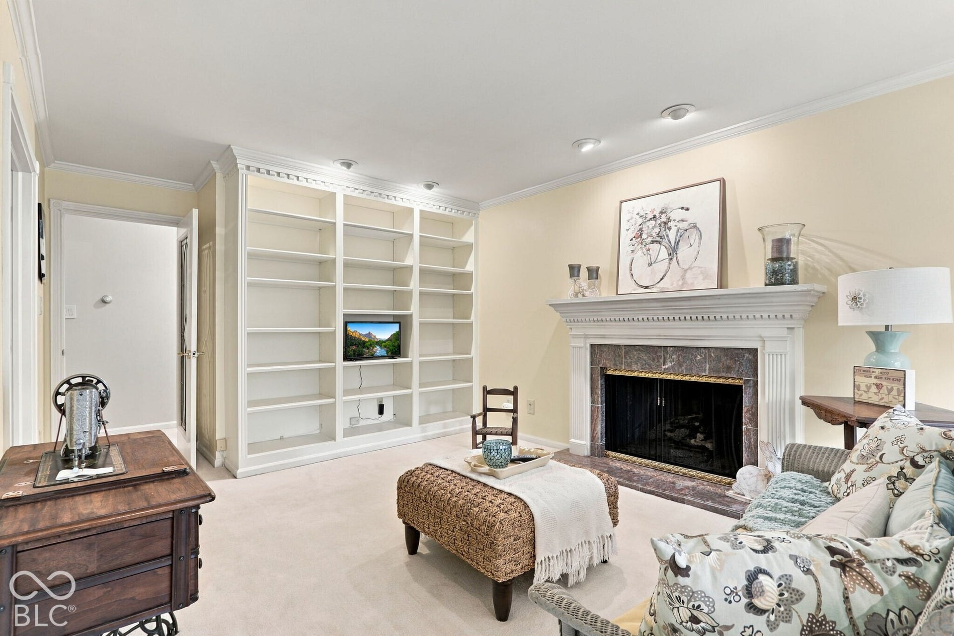 Build in shelves and a cozy fireplace