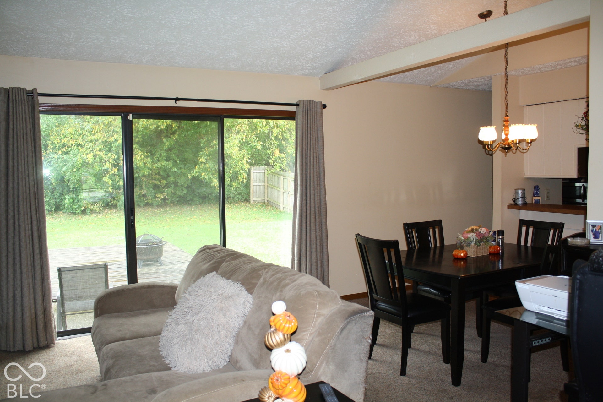 Great room with patio door to rear yard