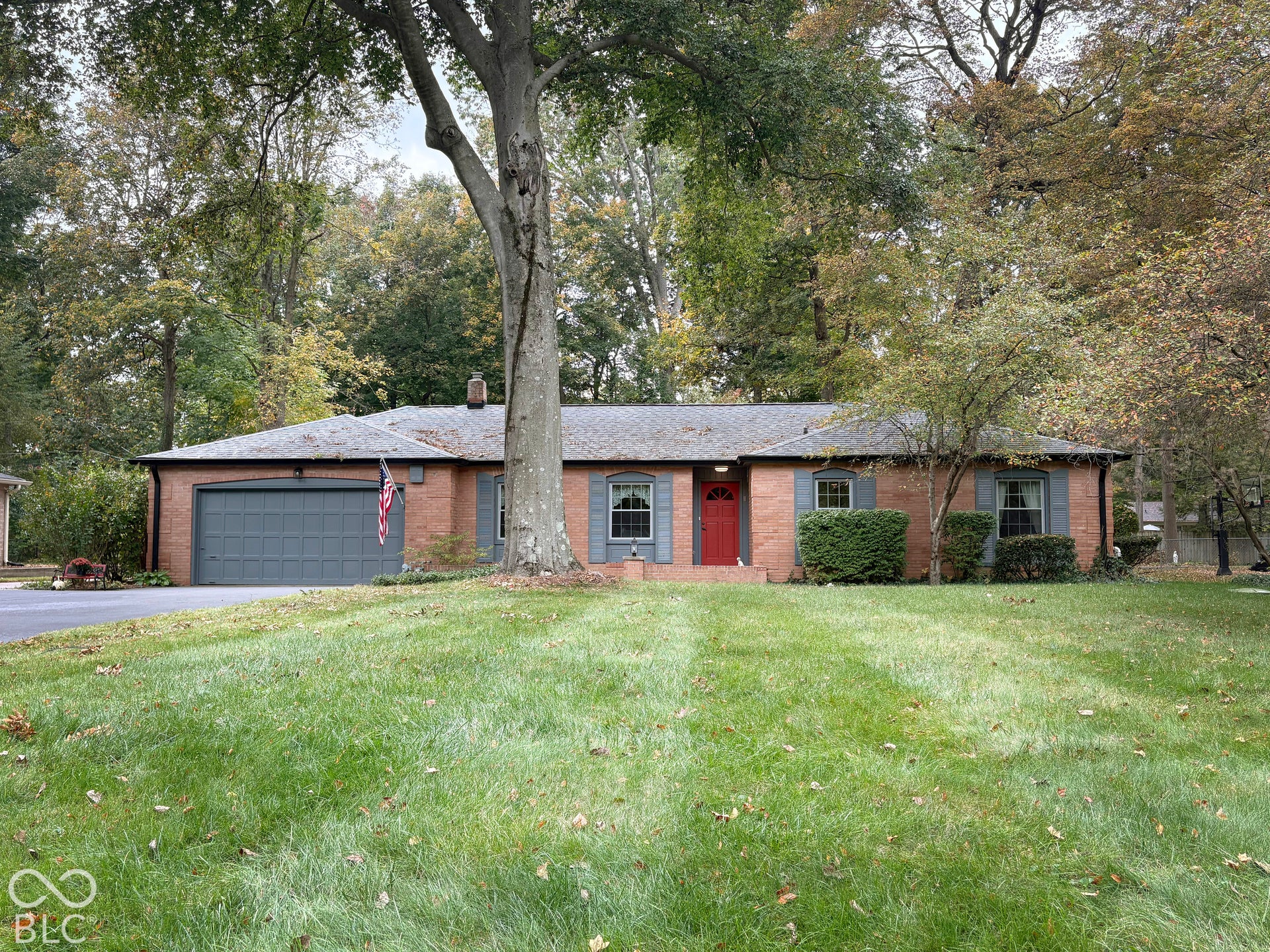All brick 1960 ranch on gorgeous .38-acre lot with mature trees.