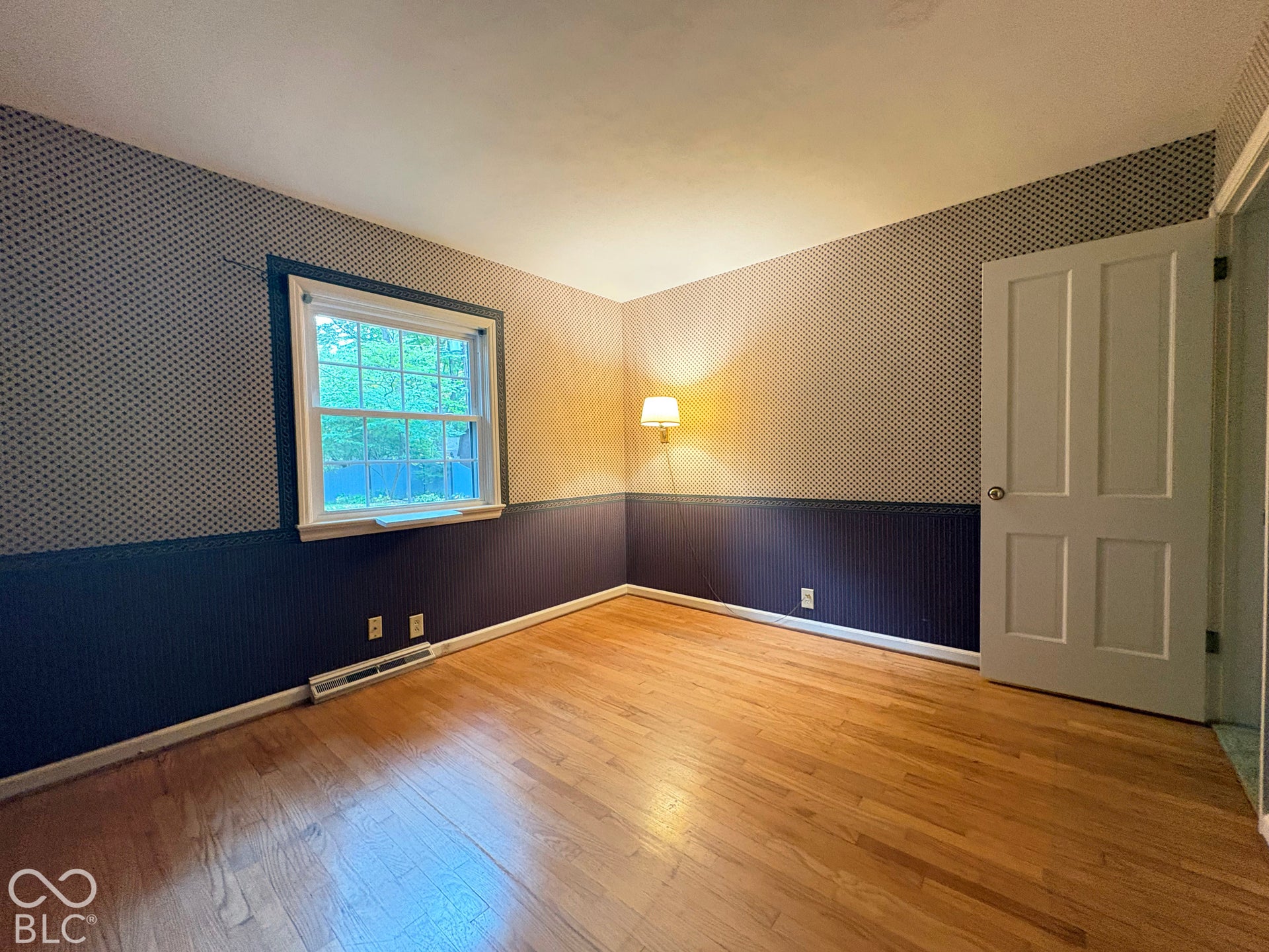 3rd bedroom with hardwood floors.