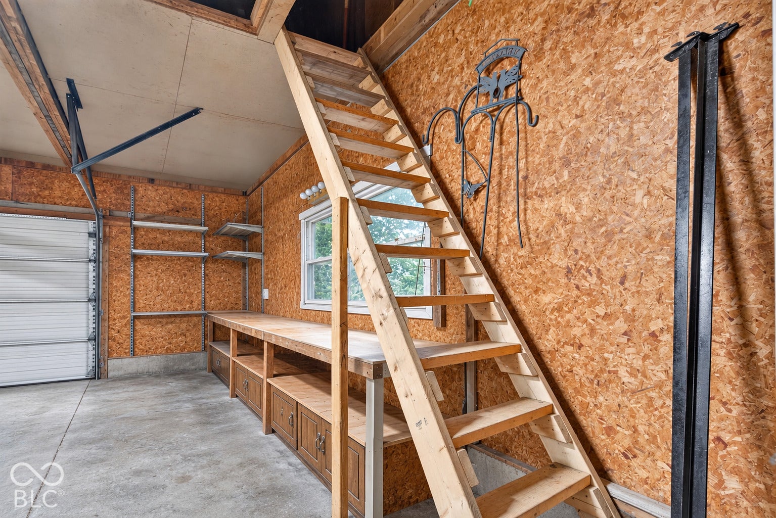 Huge attic storage in detached garage.