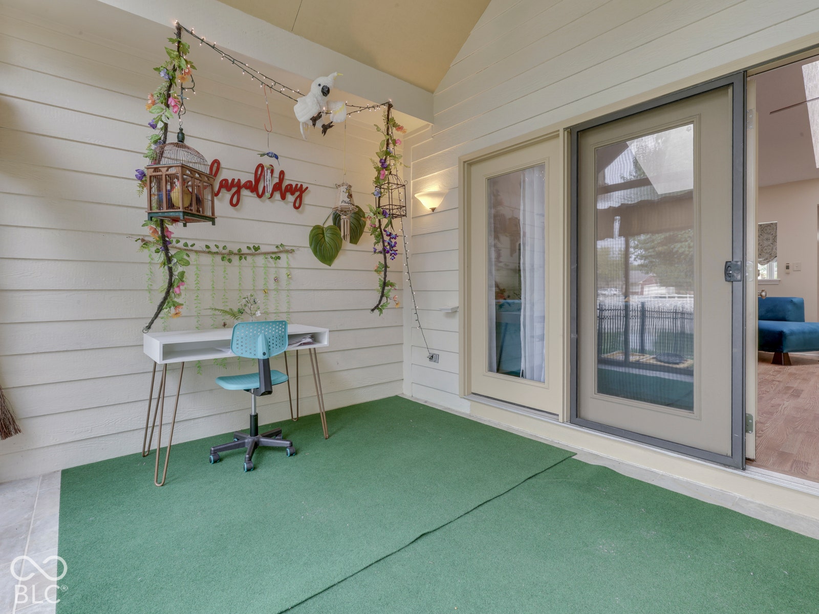 770 Ivy Lane, Greenwood, IN 46143 Covered porch featuring horizontal lap siding, wall-mounted light fixture, and a full-glass entry door with screen