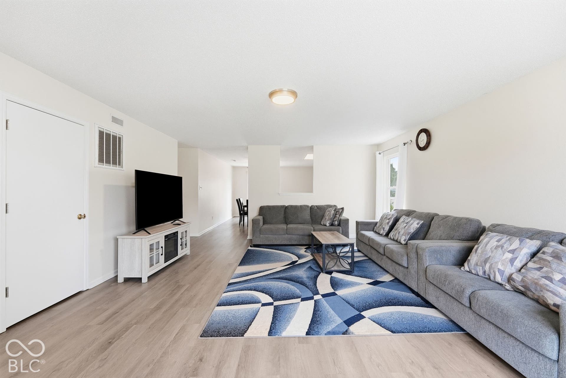 Wood-finish flooring and neutral wall paint