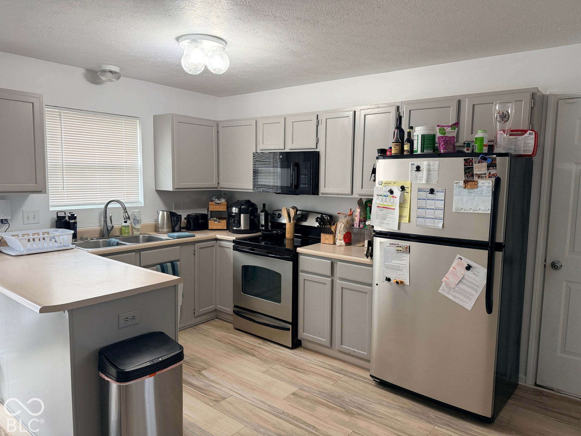 Stainless Steel appliances and plenty of cabinet space..