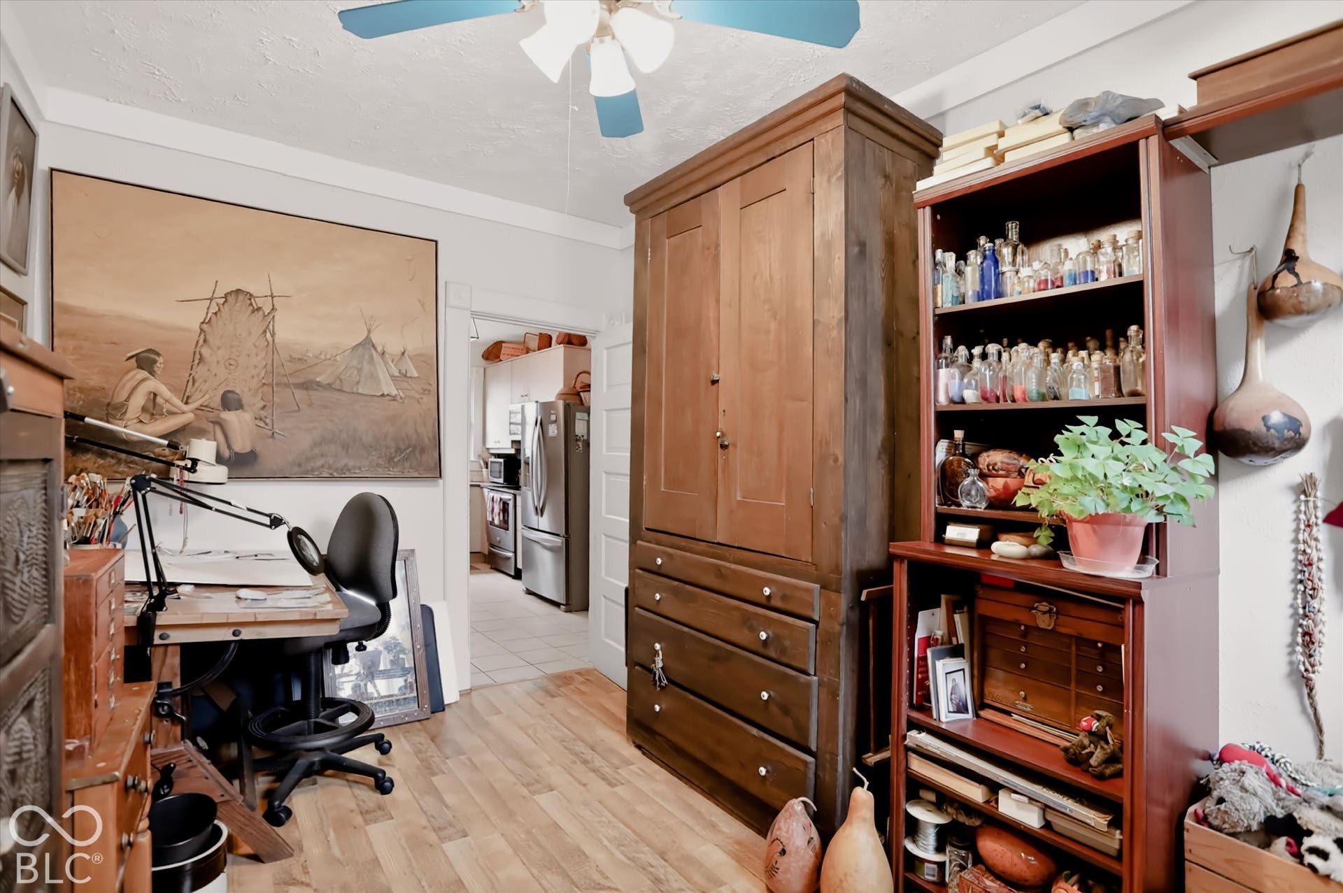 304 W 4th Street, Greenfield, IN 46140 Room featuring wood-finish flooring and a ceiling-mounted fan with light fixture