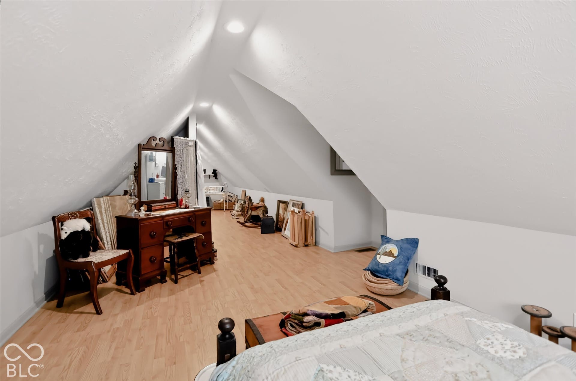 304 W 4th Street, Greenfield, IN 46140 Attic space with sloped ceilings, wood-finish flooring, and recessed lighting