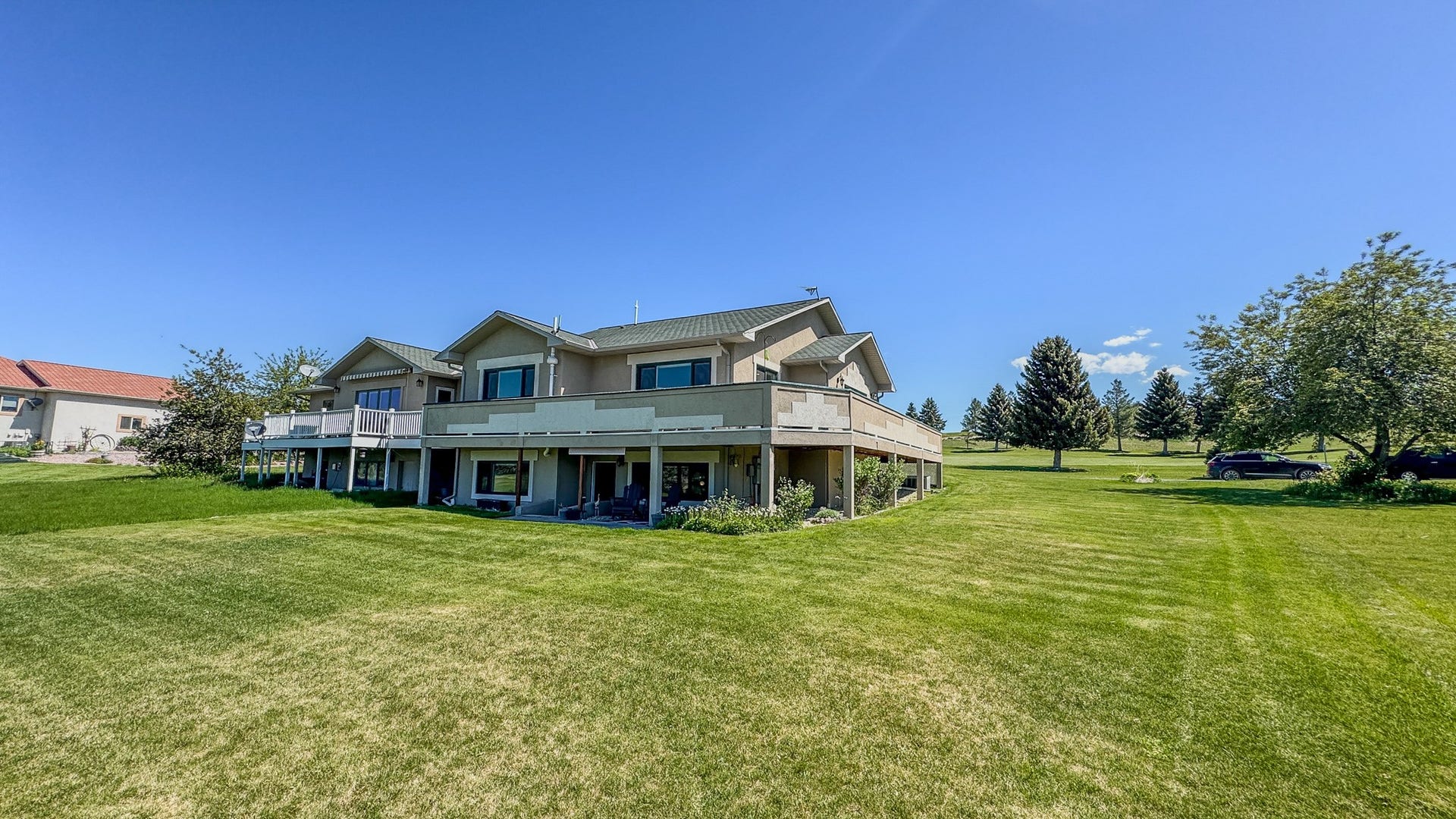 4134 Fox Ridge Drive, Helena, MT 59602 Back of house with a yard