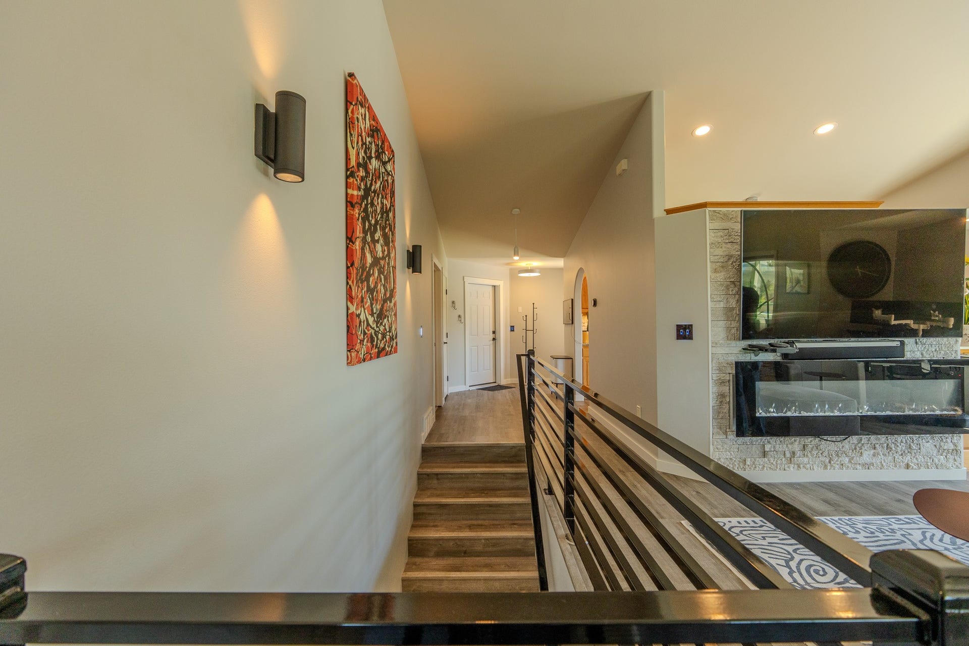4134 Fox Ridge Drive, Helena, MT 59602 Stairway featuring wood finished floors, recessed lighting, and vaulted ceiling