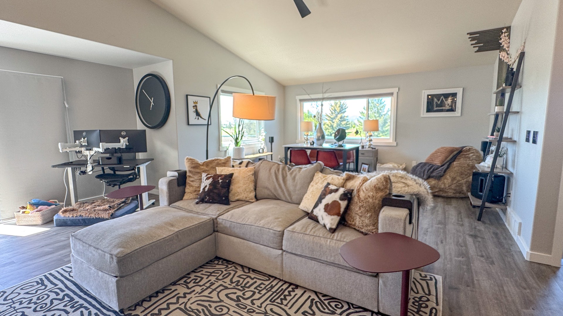 4134 Fox Ridge Drive, Helena, MT 59602 Living area featuring wood finished floors, lofted ceiling, a ceiling fan, and baseboards