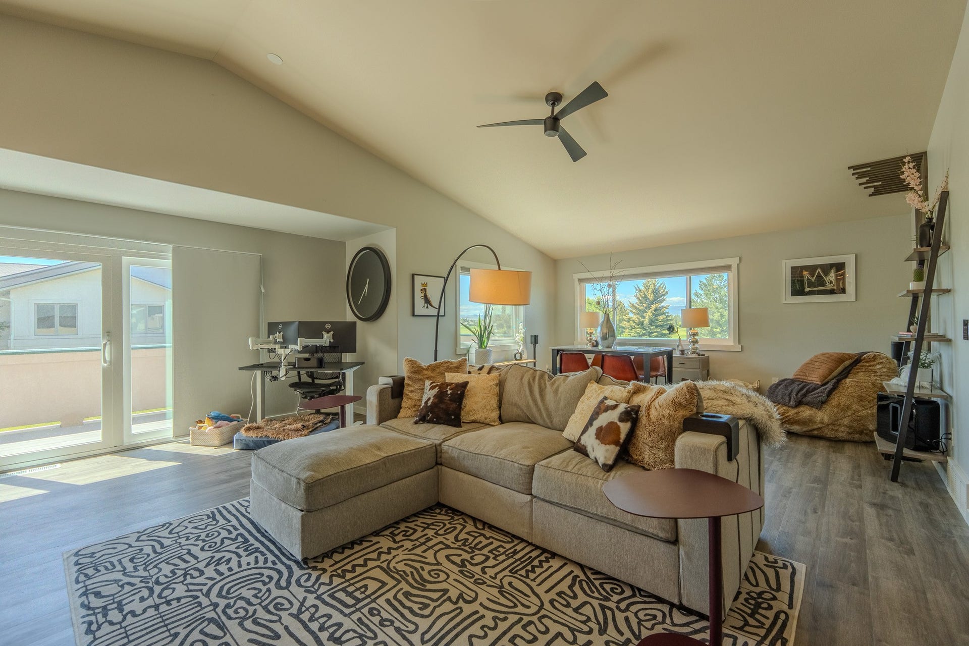 4134 Fox Ridge Drive, Helena, MT 59602 Living area featuring wood finished floors, lofted ceiling, and a ceiling fan
