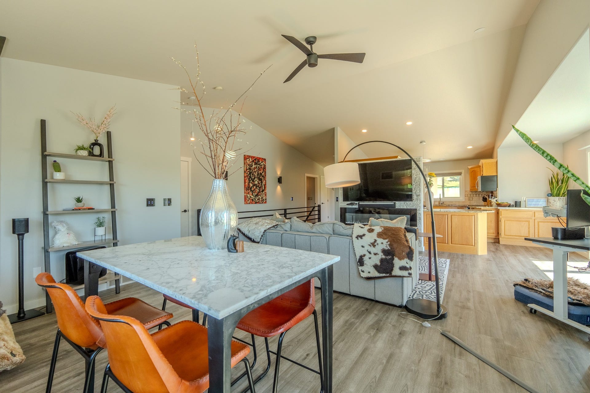 4134 Fox Ridge Drive, Helena, MT 59602 Kitchen featuring light brown cabinets, a ceiling fan, light wood-style floors, vaulted ceiling, and light countertops