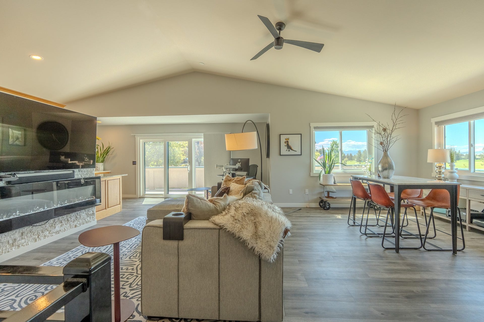 4134 Fox Ridge Drive, Helena, MT 59602 Living room with a ceiling fan, lofted ceiling, plenty of natural light, wood finished floors, and recessed lighting