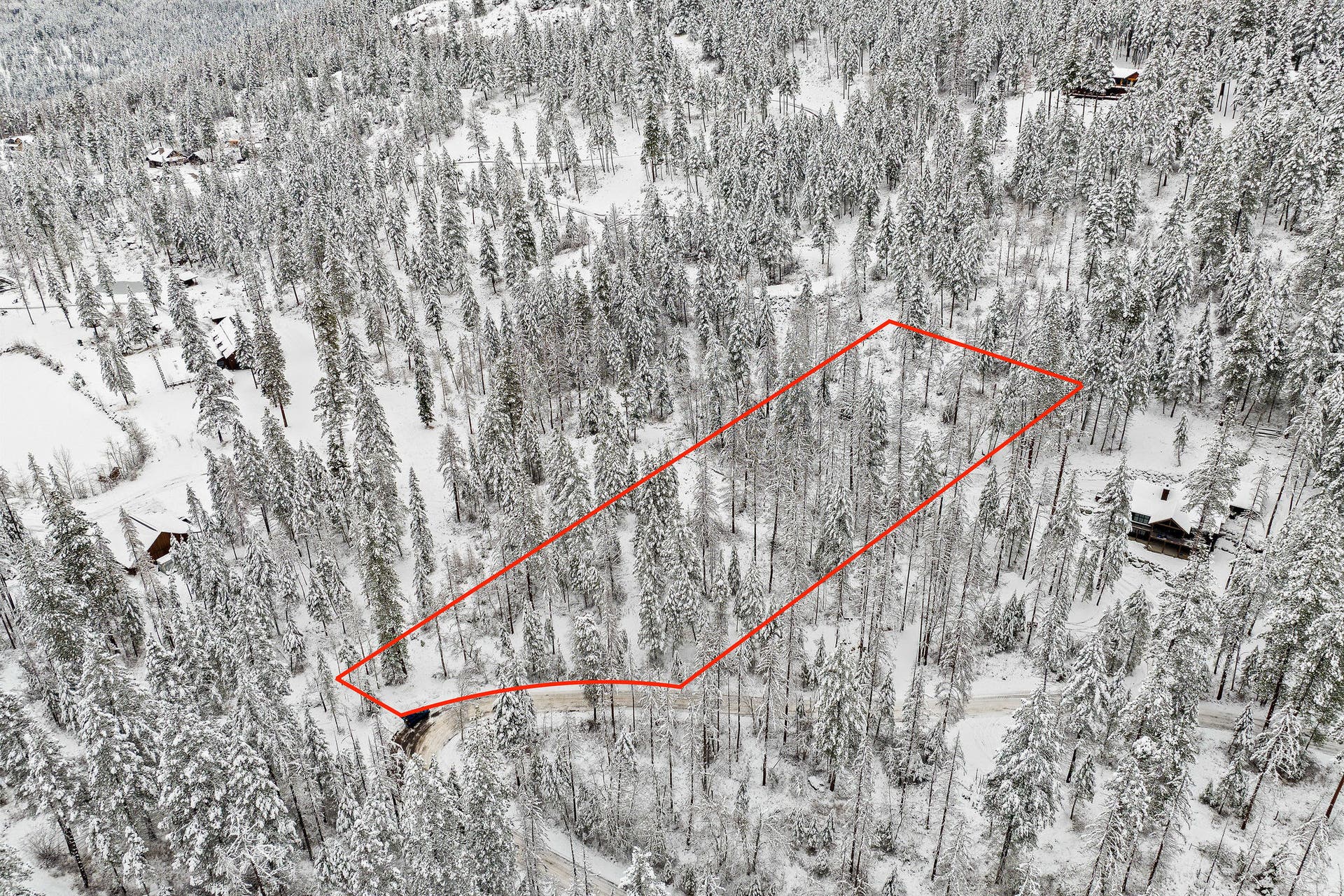 375 Ranch Road, Bigfork, MT 59911 Wide aerial view with the lot boundaries outlined