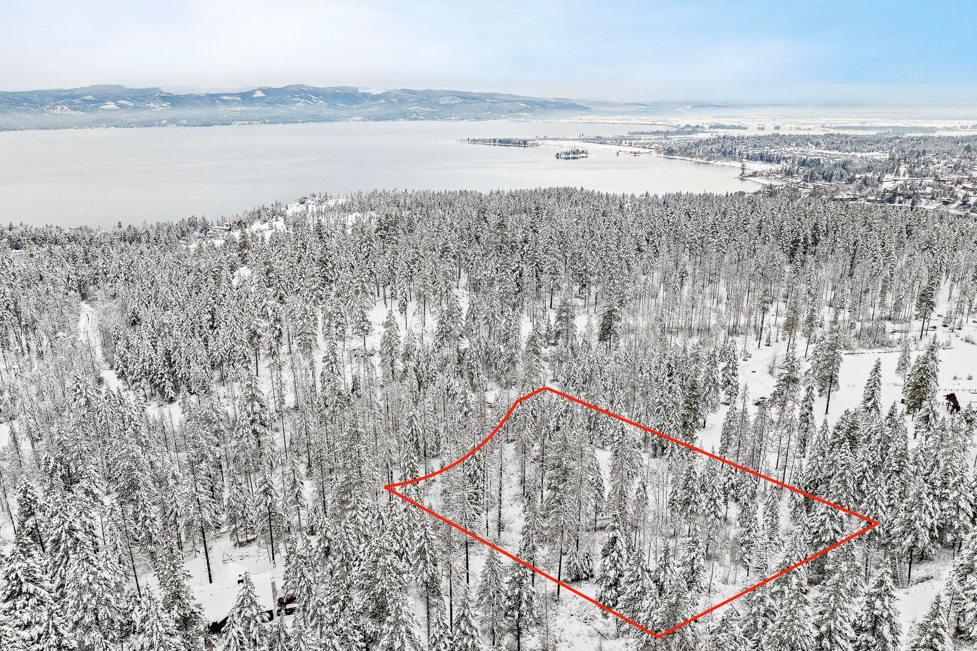 375 Ranch Road, Bigfork, MT 59911 Panoramic view looking towards Bigfork with the property lines highlighted
