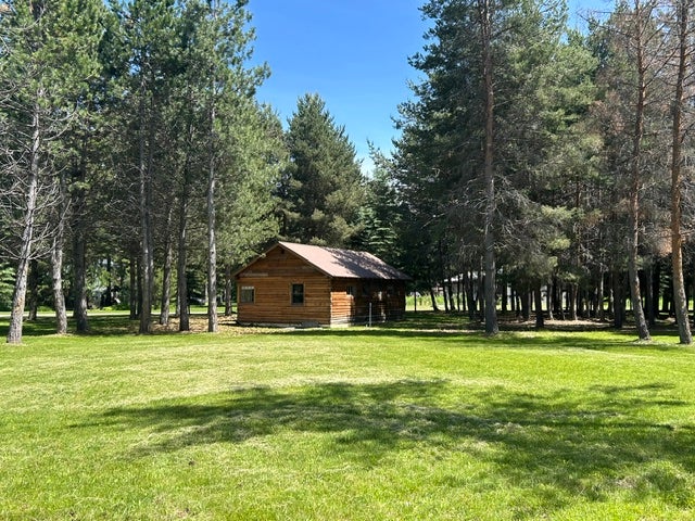 72 Pilots Trail, Bigfork, MT 59911 Smaller Cabin on parked out 5 acres