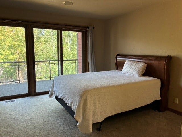 68 Bay Harbor Drive, Bigfork, MT 59911 Bedroom 2 with balcony
