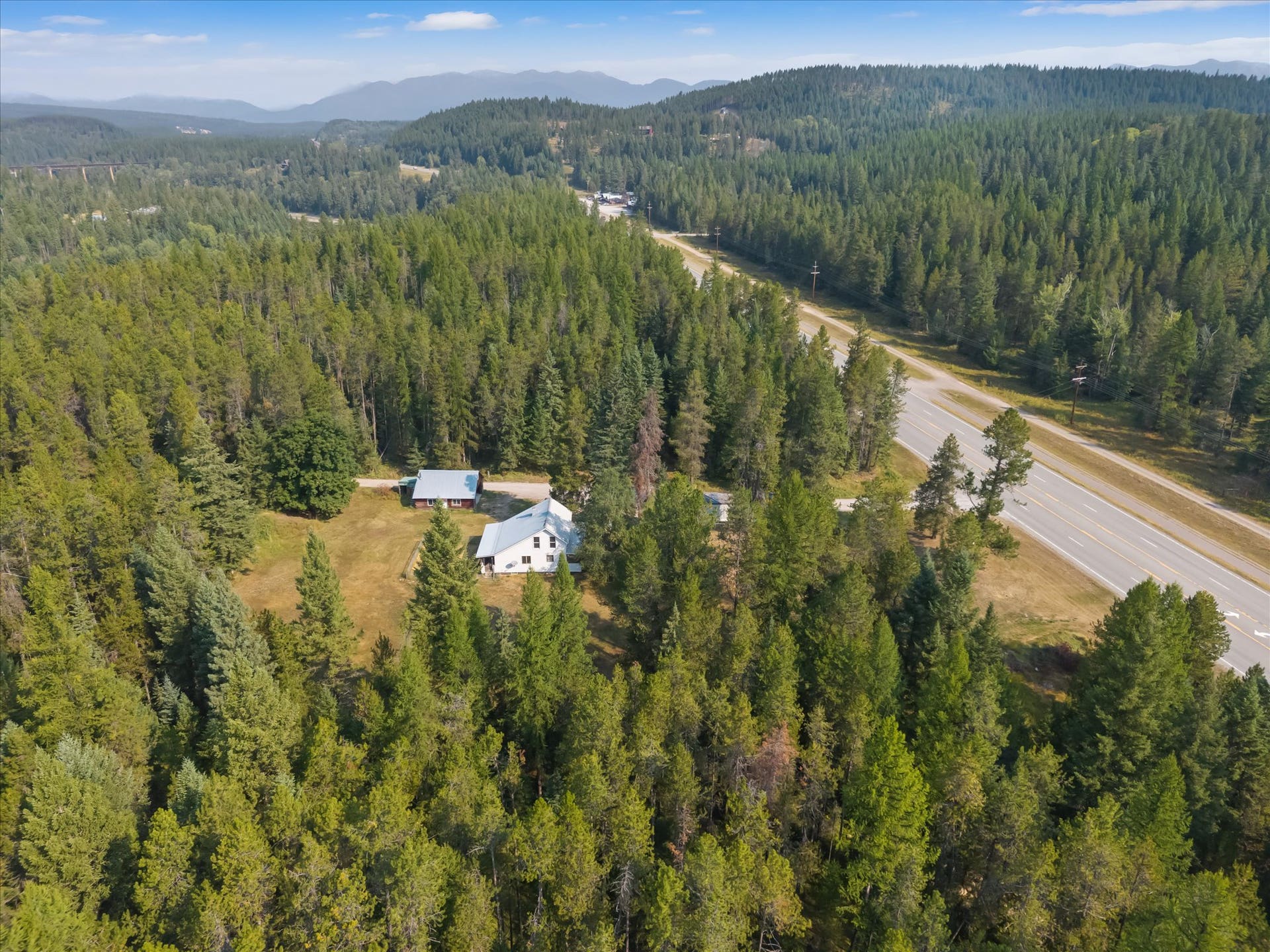 9590 US Hwy 2 E, Martin City, MT 59926 Aerial view of commercial property with Highway 2 frontage near Glacier National Park