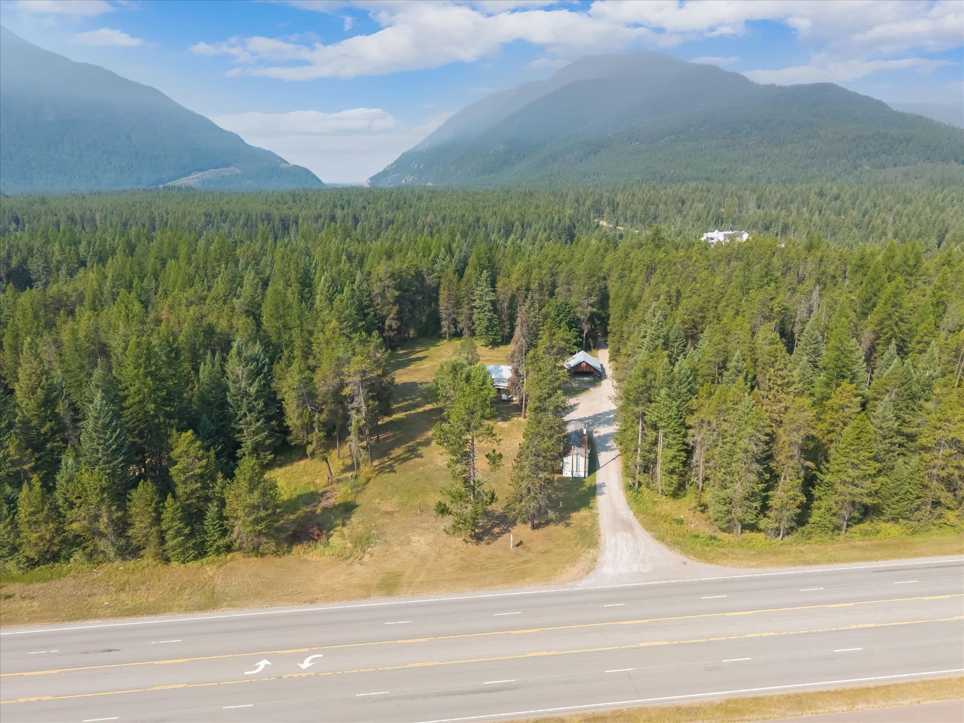9590 US Hwy 2 E, Martin City, MT 59926 Aerial view of commercial property with Highway 2 frontage near Glacier National Park