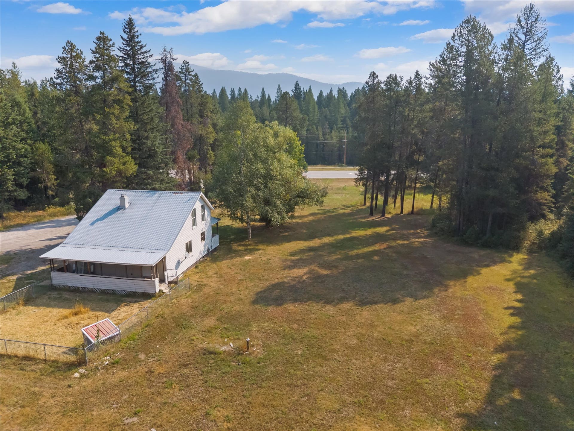 9590 US Hwy 2 E, Martin City, MT 59926 Aerial view of commercial property with Highway 2 frontage near Glacier National Park