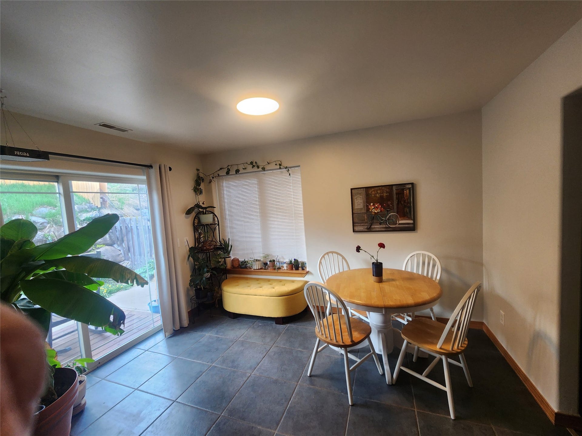 114 Sunrise Terrace, #114, Bigfork, MT 59911 Slate tile flooring complements the neutral wall tones
