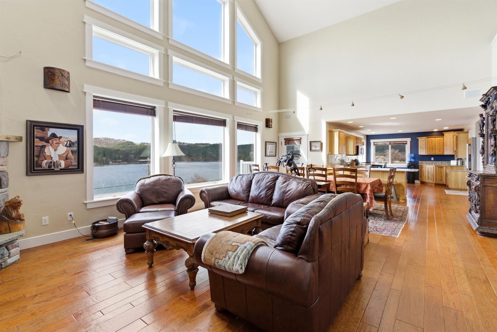 45 Roybals Way, Kalispell, MT 59901 Living area featuring light wood finished floors, healthy amount of natural light, and lofted ceiling