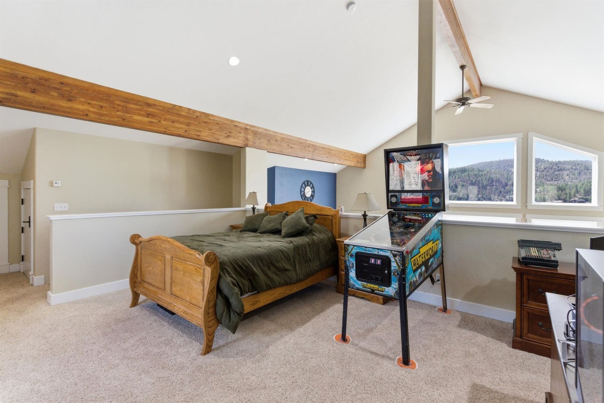 45 Roybals Way, Kalispell, MT 59901 Bedroom featuring beamed ceiling and light colored carpet