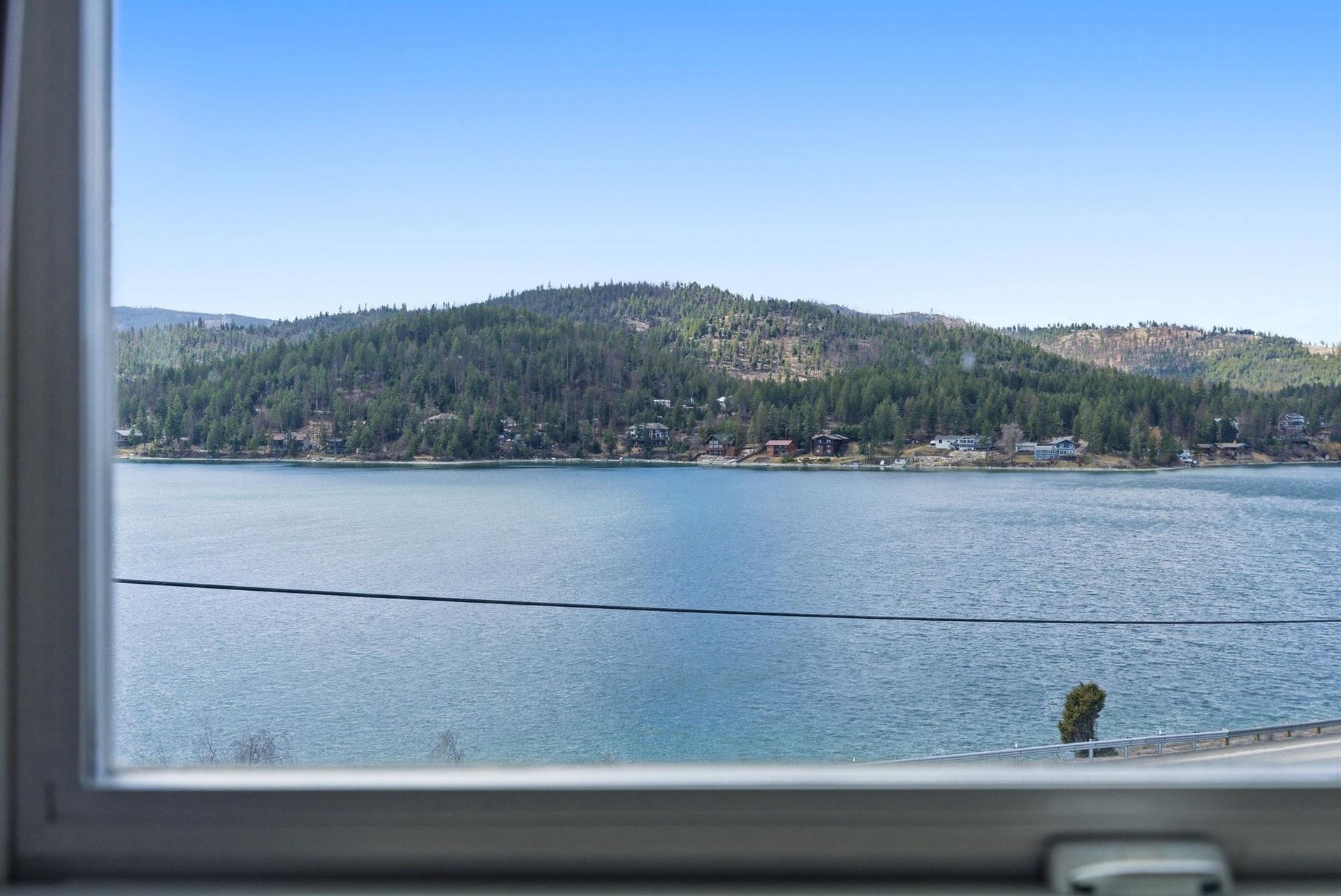 45 Roybals Way, Kalispell, MT 59901 Water view featuring a heavily wooded area