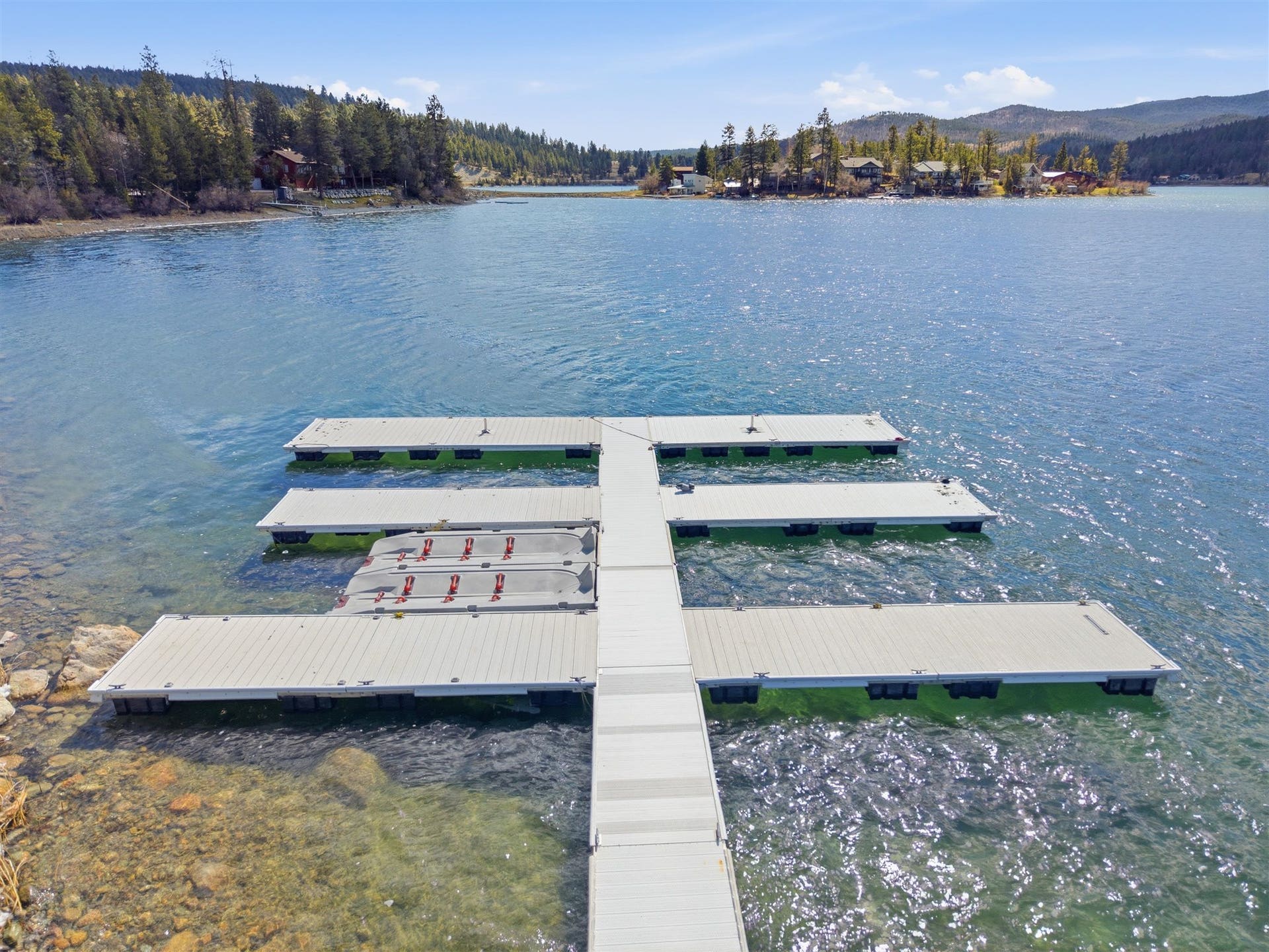 45 Roybals Way, Kalispell, MT 59901 Dock area featuring a water and mountain view