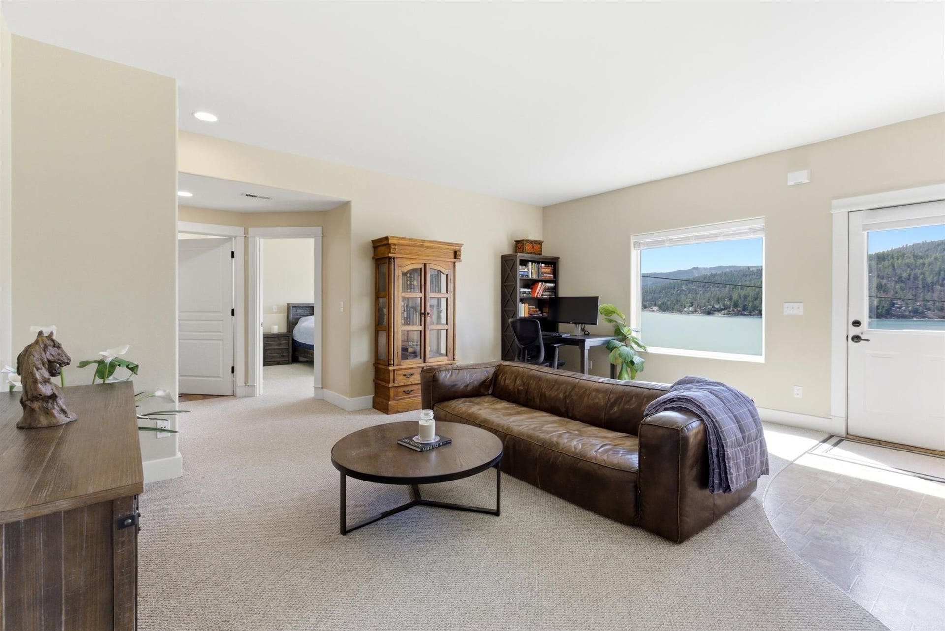 45 Roybals Way, Kalispell, MT 59901 Living room featuring light colored carpet and recessed lighting