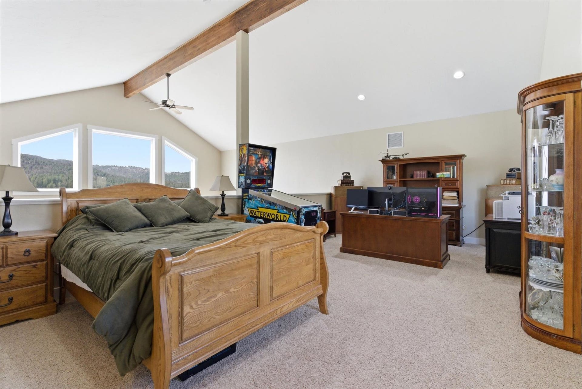 45 Roybals Way, Kalispell, MT 59901 Bedroom featuring light colored carpet and beam ceiling