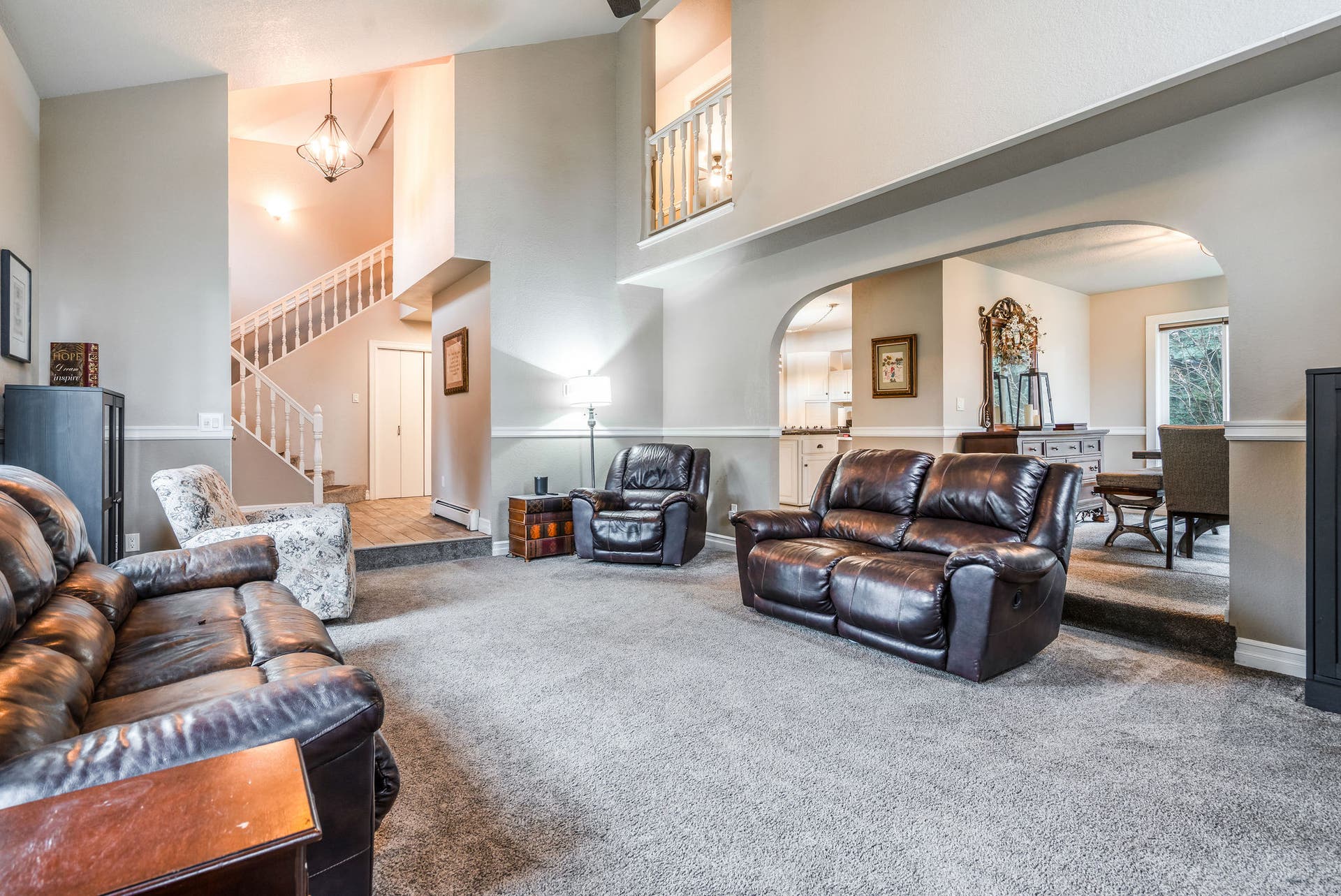 163 Crestview Drive, Bigfork, MT 59911 Open-concept layout highlighting the flow between the living room, dining area, and upper loft
