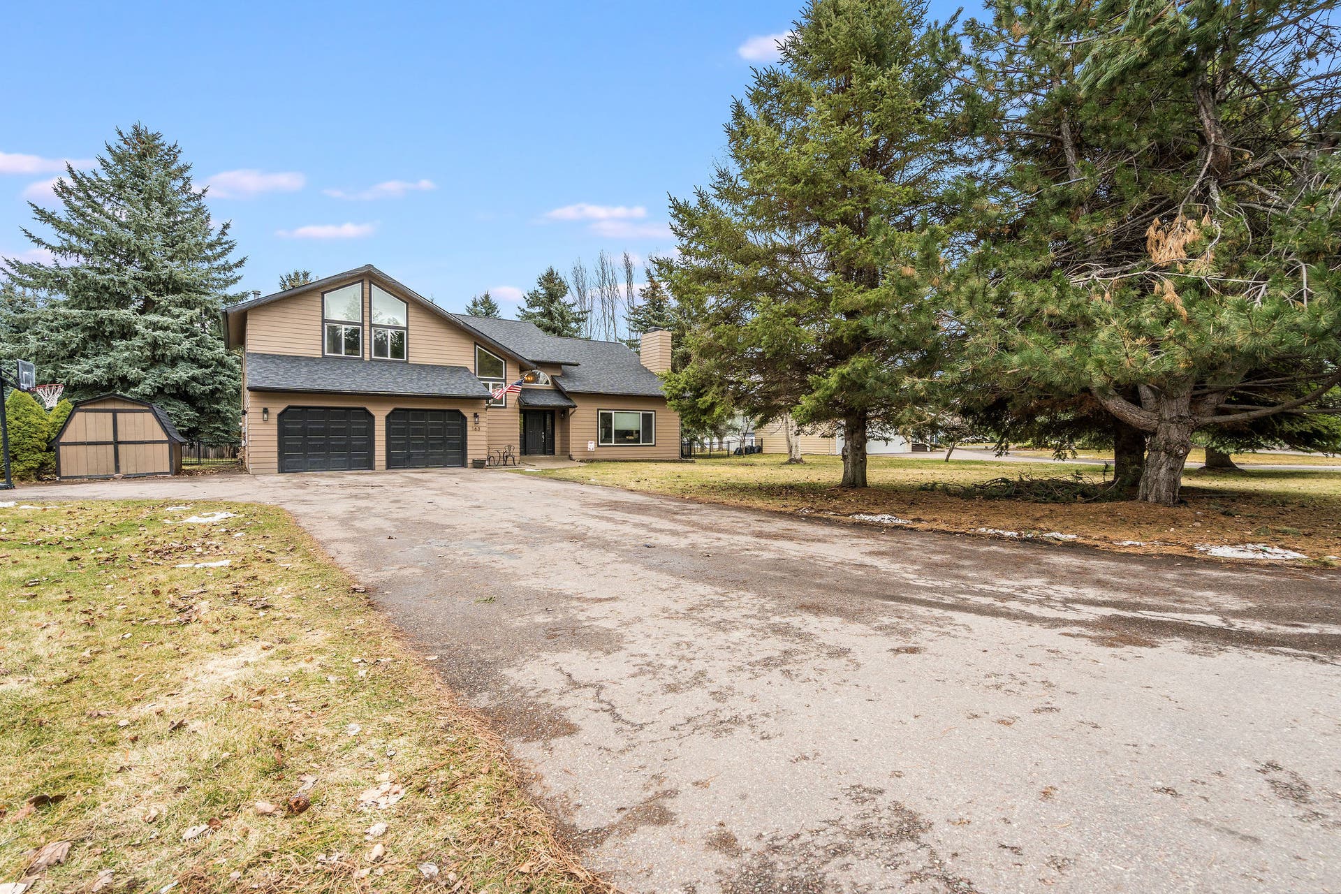 163 Crestview Drive, Bigfork, MT 59911 Large paved driveway offers plenty of parking and leads to a functional storage shed