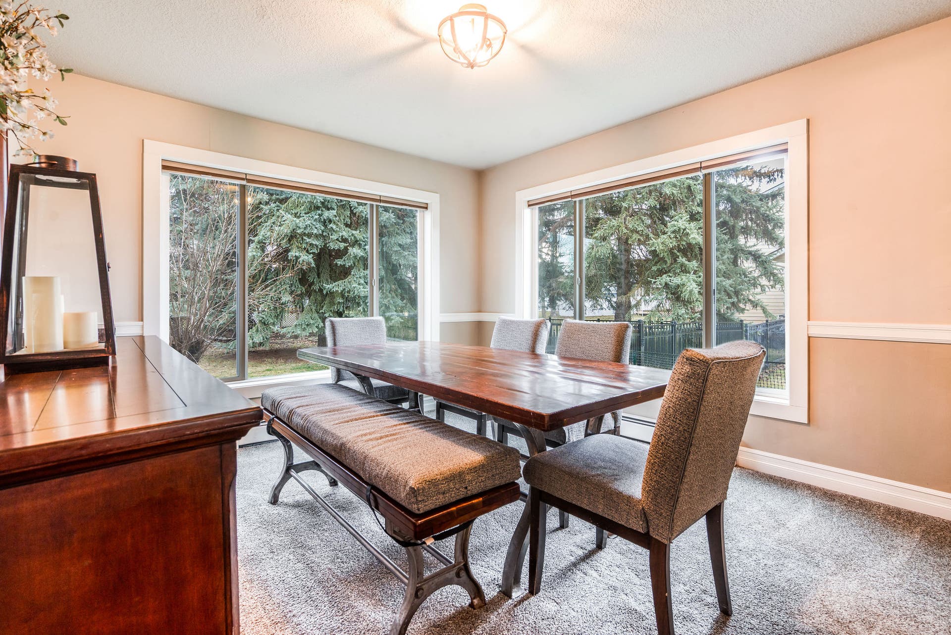 163 Crestview Drive, Bigfork, MT 59911 Formal dining room with large windows overlooking the mature landscaping
