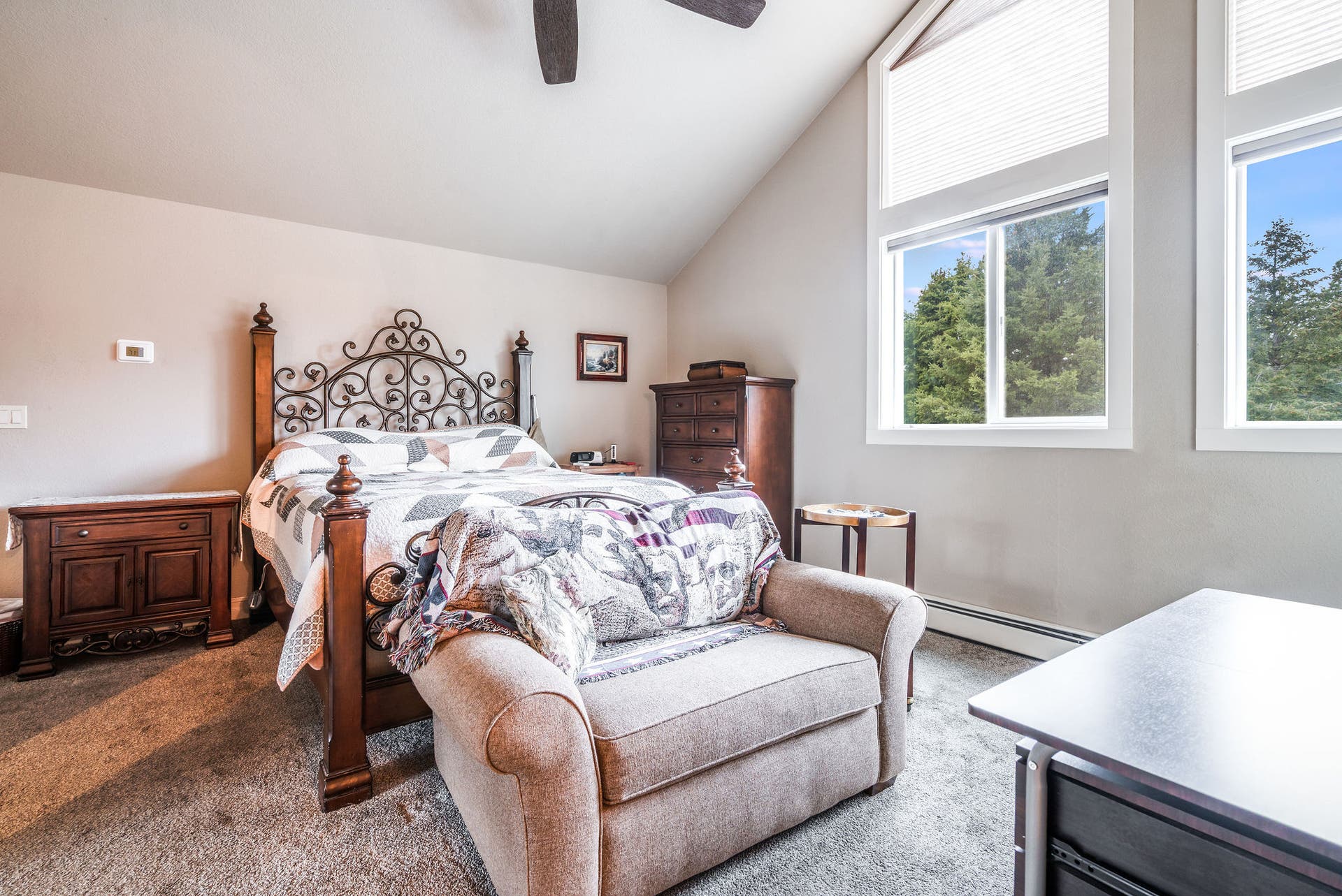 163 Crestview Drive, Bigfork, MT 59911 Light-filled primary suite offering high ceilings and a cozy atmosphere