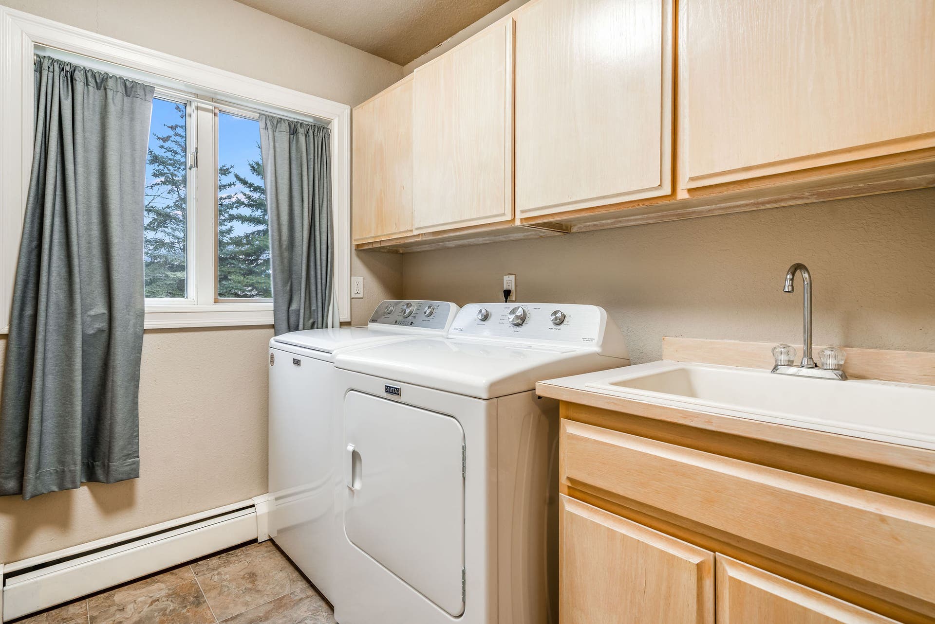 163 Crestview Drive, Bigfork, MT 59911 Large laundry room equipped with a utility sink