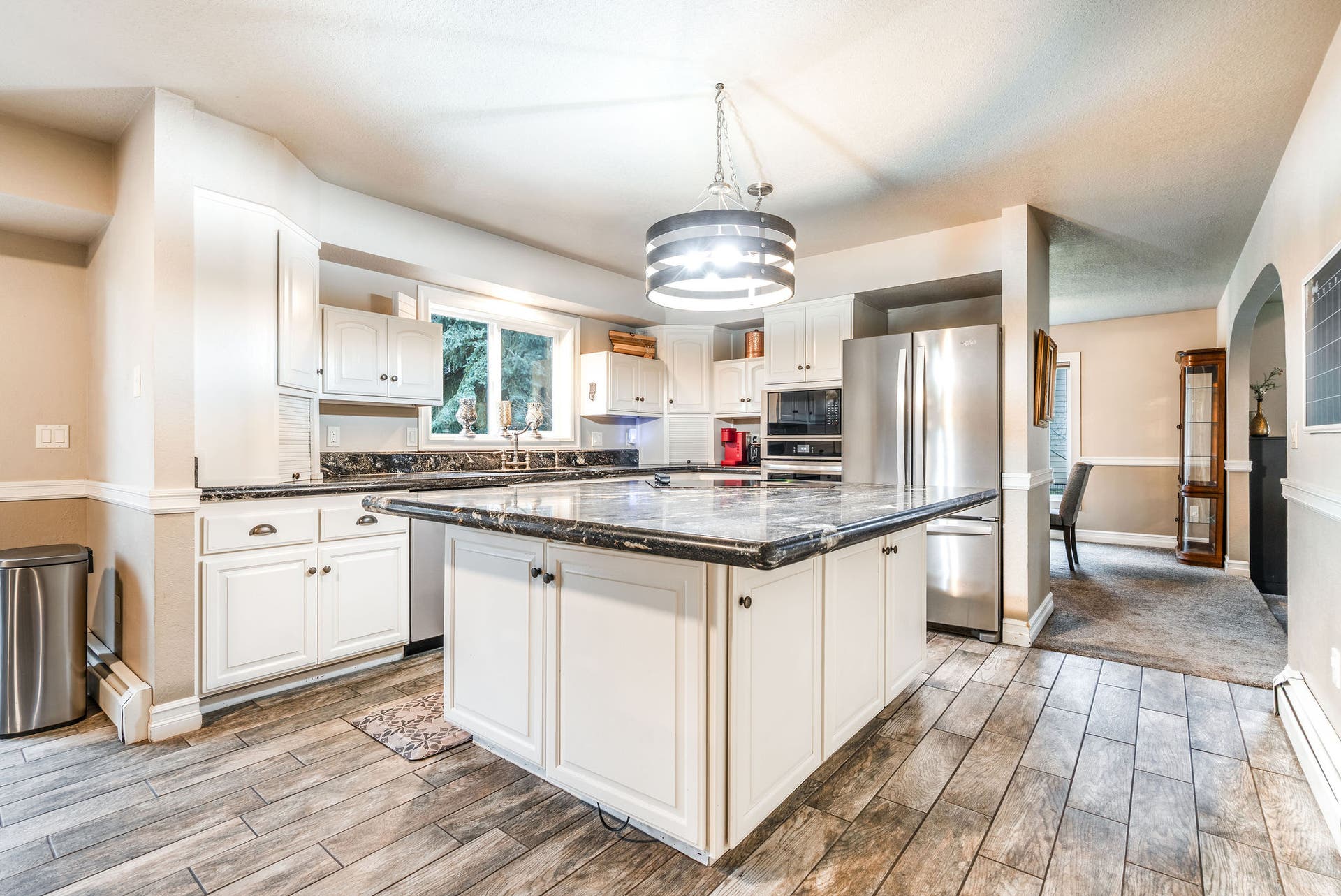 163 Crestview Drive, Bigfork, MT 59911 The large center island serves as a functional hub for meal prep and casual dining
