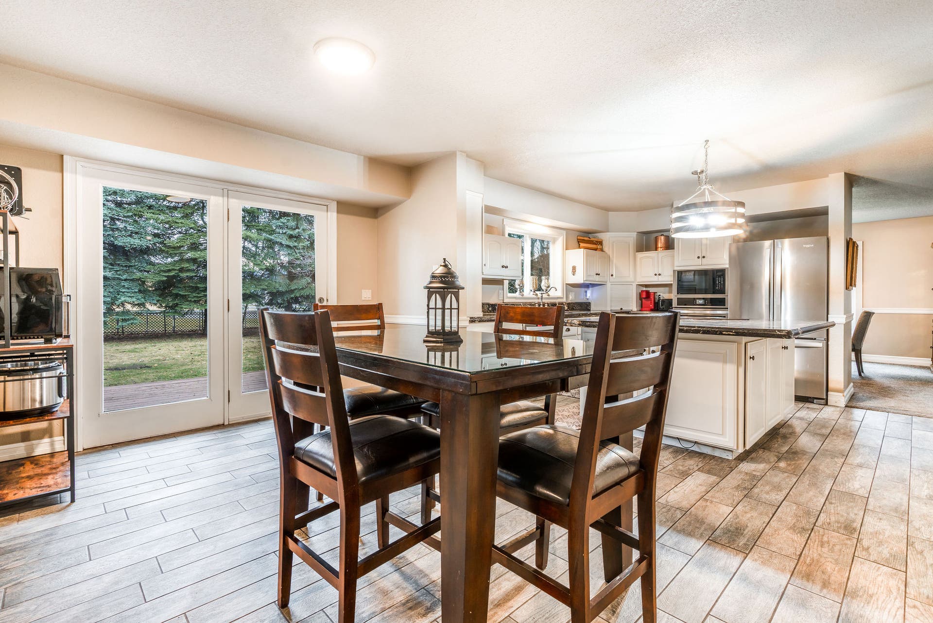 163 Crestview Drive, Bigfork, MT 59911 Sun-drenched breakfast area with back deck access