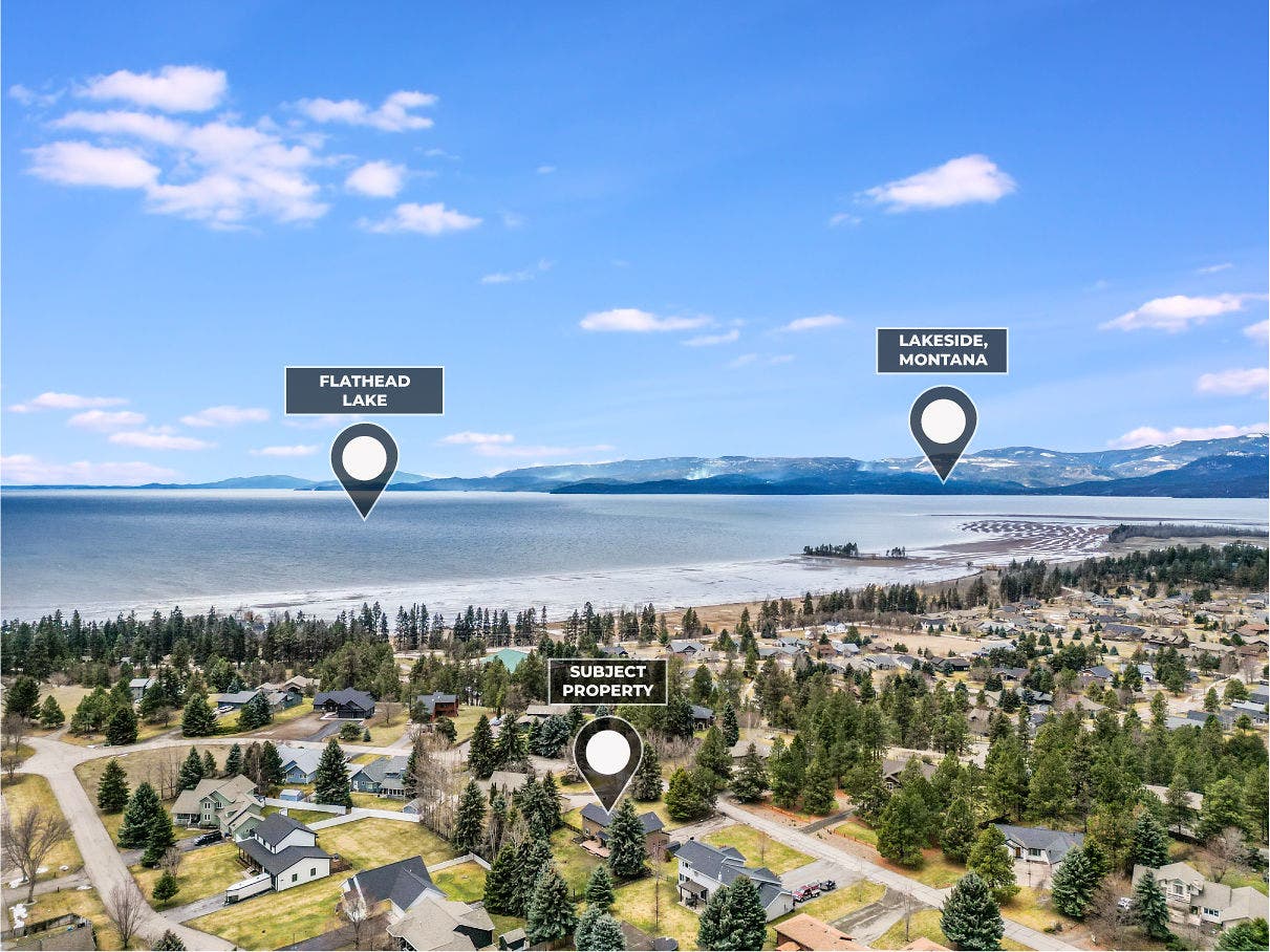 163 Crestview Drive, Bigfork, MT 59911 Aerial perspective showing the subject property's prime location near the shores of Flathead Lake and its proximity to Lakeside, Montana