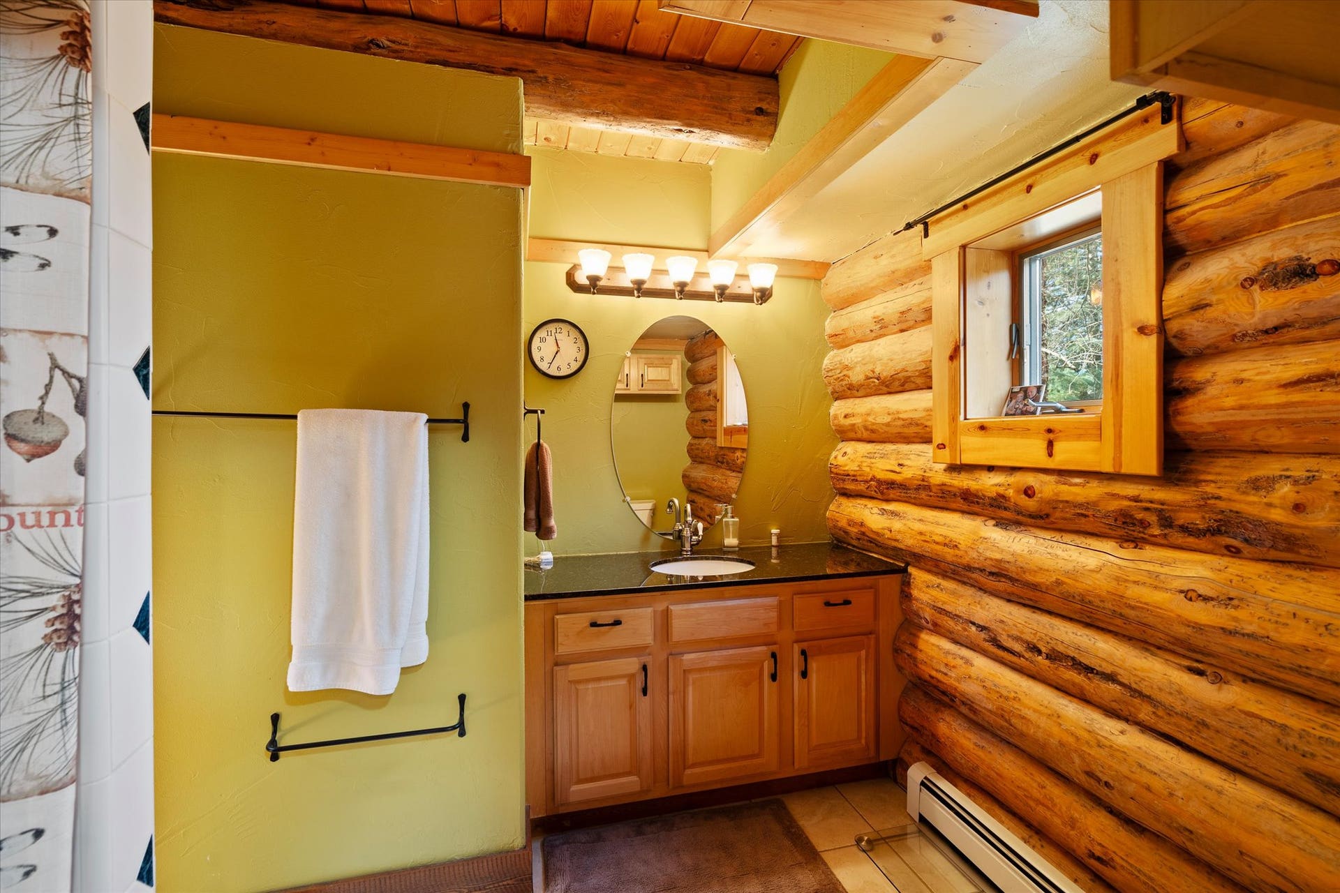182 Moondance Trail, Bigfork, MT 59911 Bath adjacent to laundry and kitchen area. Main level.