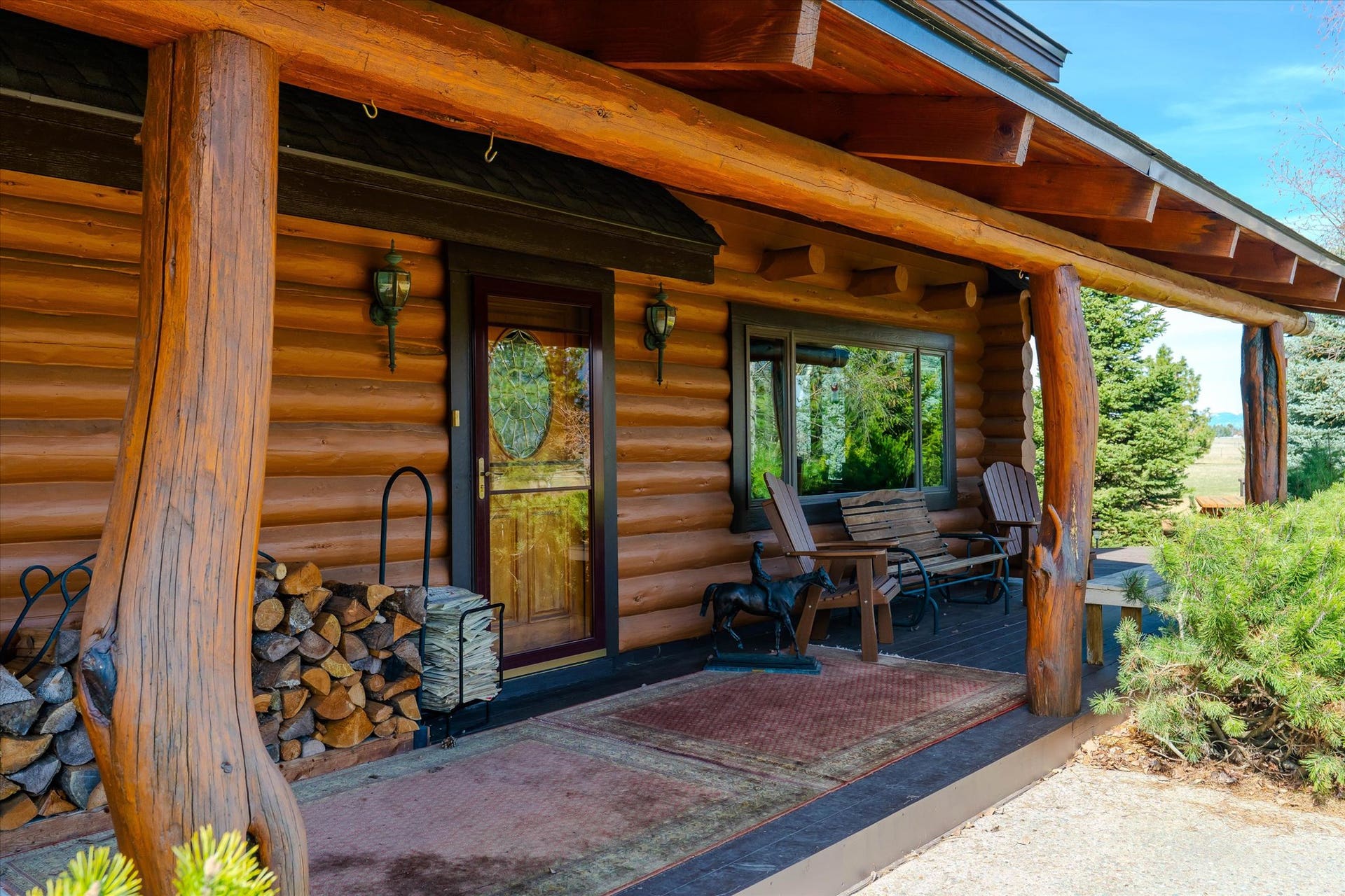 182 Moondance Trail, Bigfork, MT 59911 Front porch sitting with amazing views.