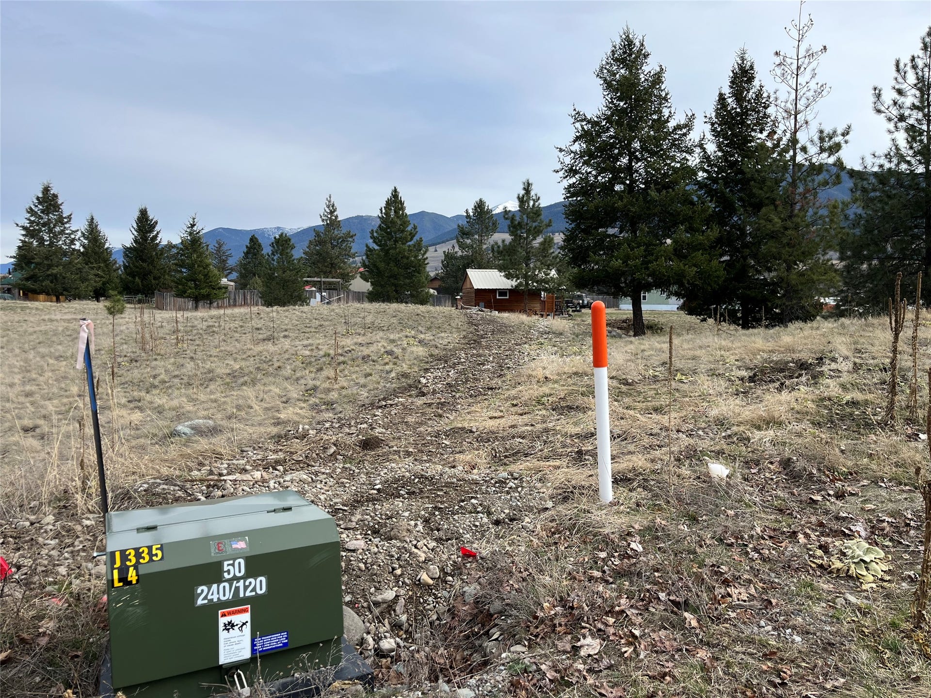 198 Acres Lane, Eureka, MT 59917 220 power and internet to cabin with potential RV hookup.