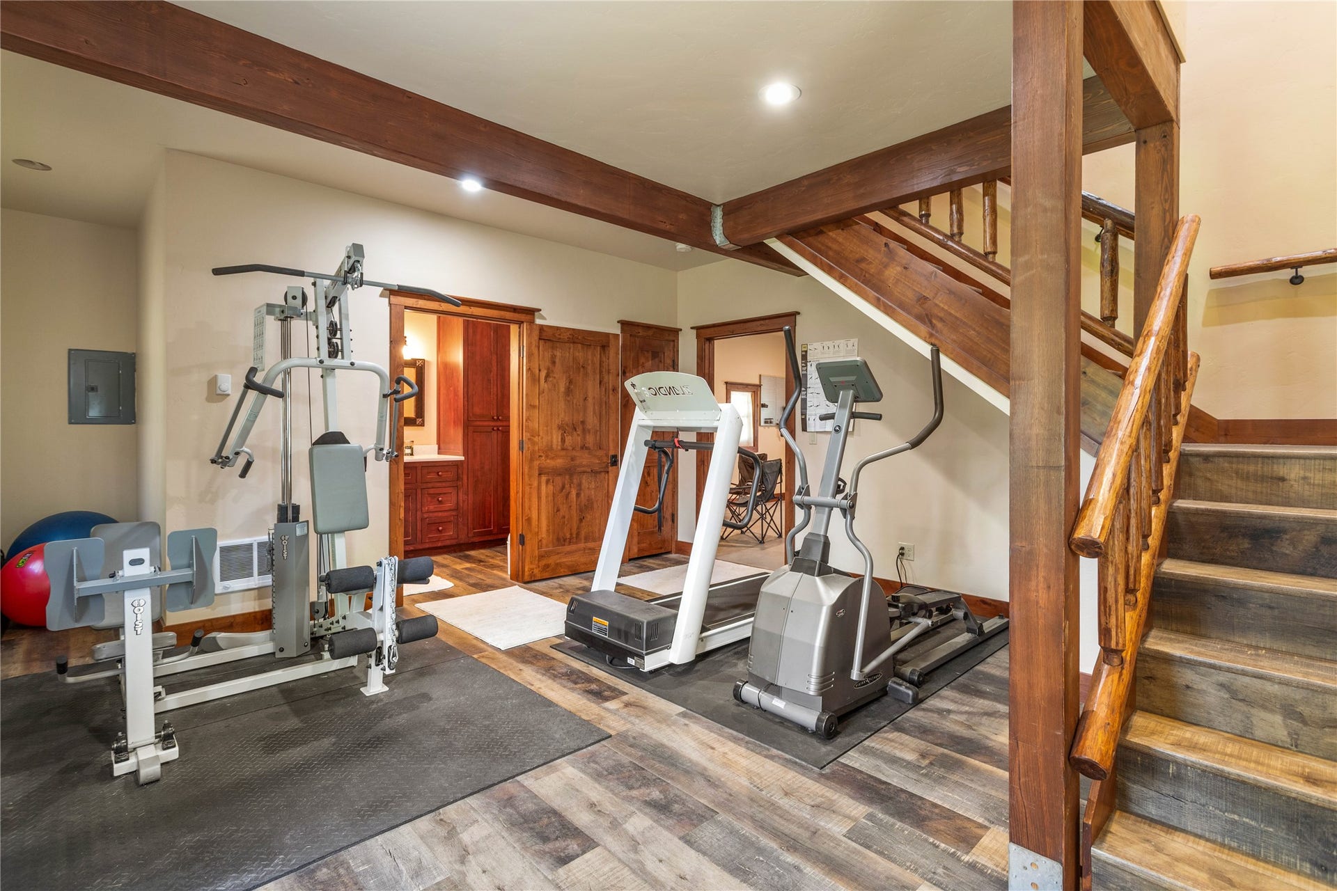 12284 Cygnet Way, Bigfork, MT 59911 Fitness room and bathroom, leading up to another spacious guest suite