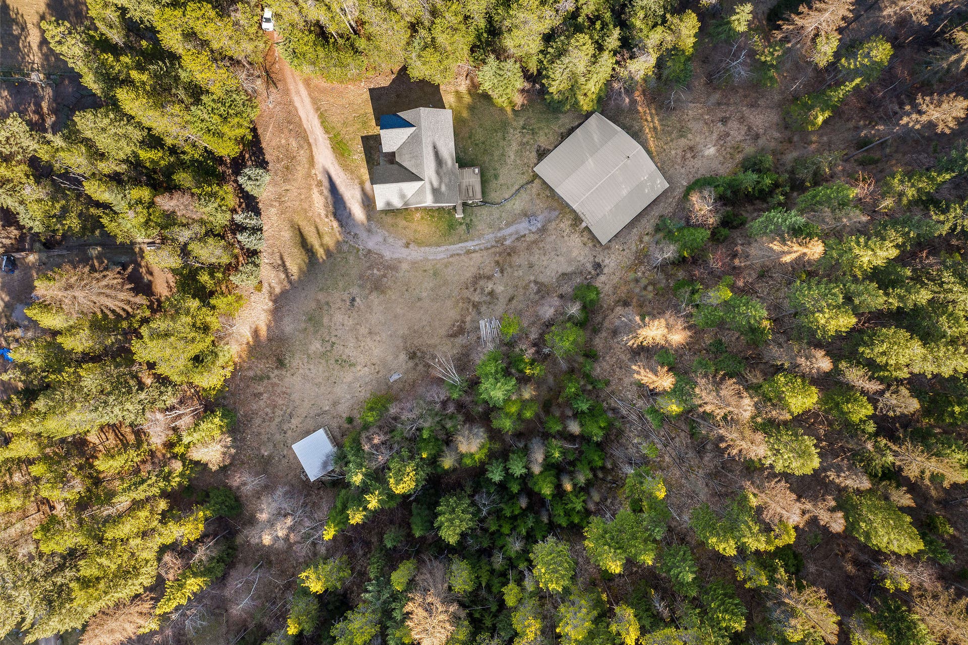 620 Swan River Road, Bigfork, MT 59911 Aerial of house and shop