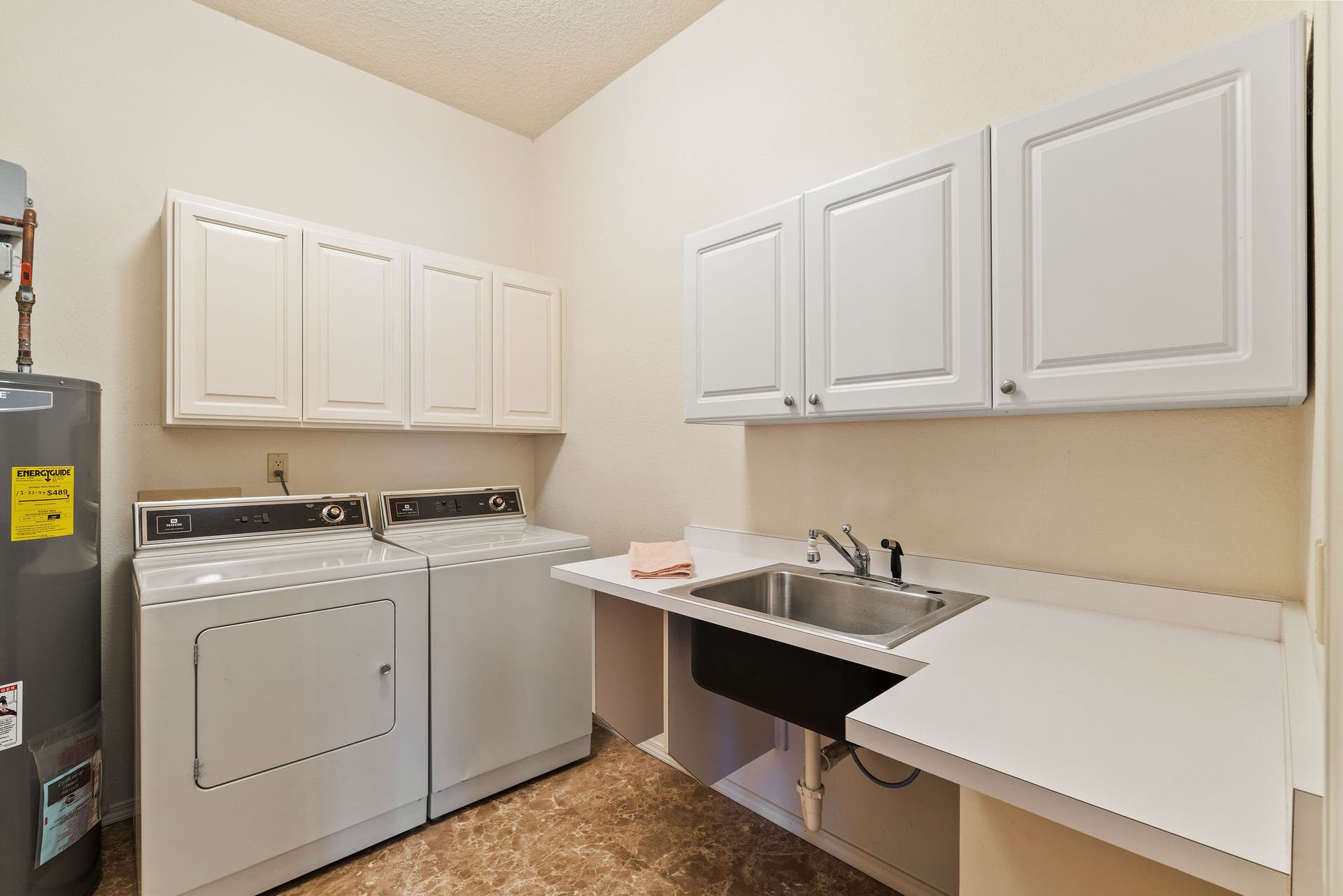 33676 Hilltop Terrace, Bigfork, MT 59911 Lower level laundry room w/ floor drain & sink