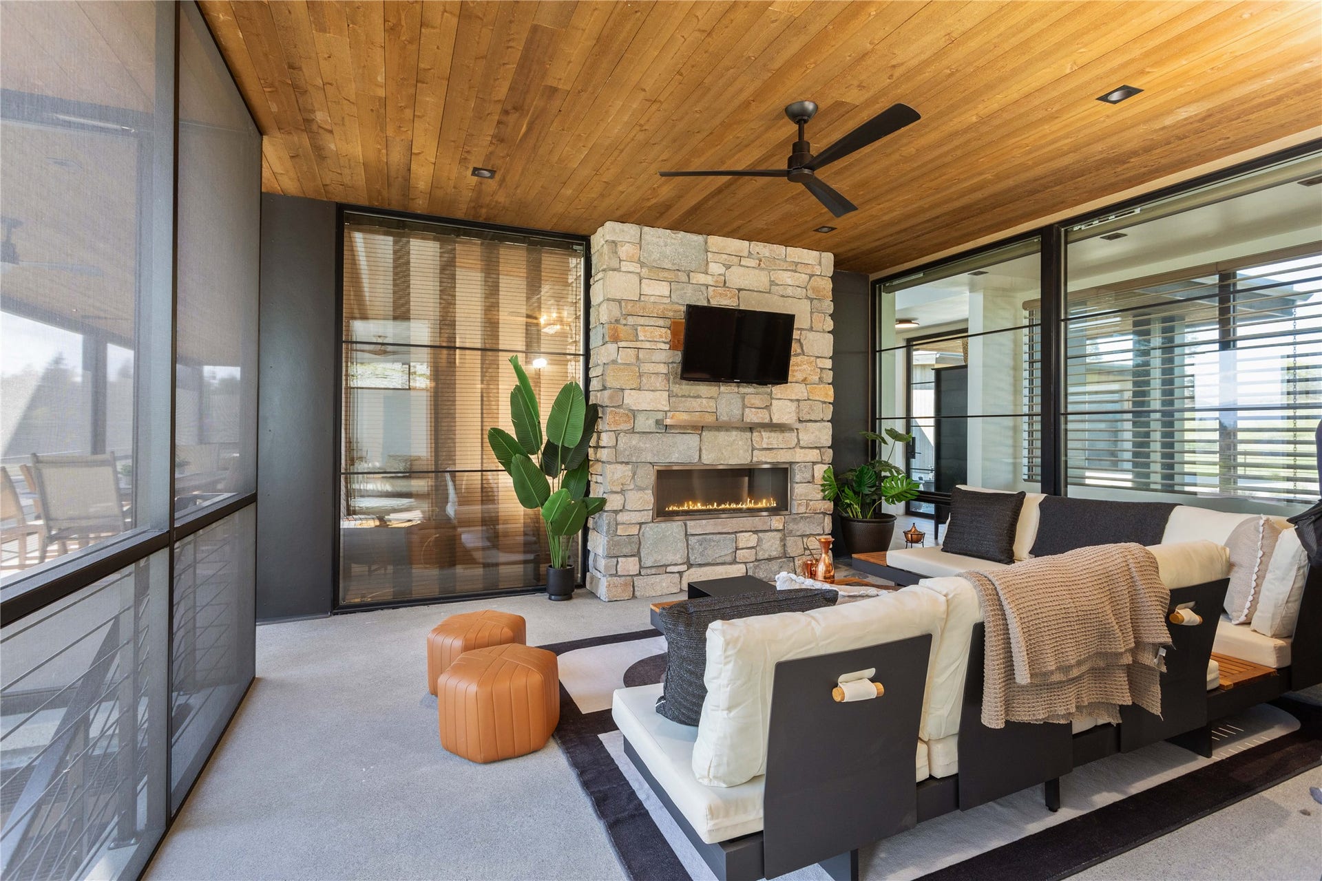 48 Eagle Rock Drive, Bigfork, MT 59911 Outdoor Fireplace and Sitting Area off Primary Suite
